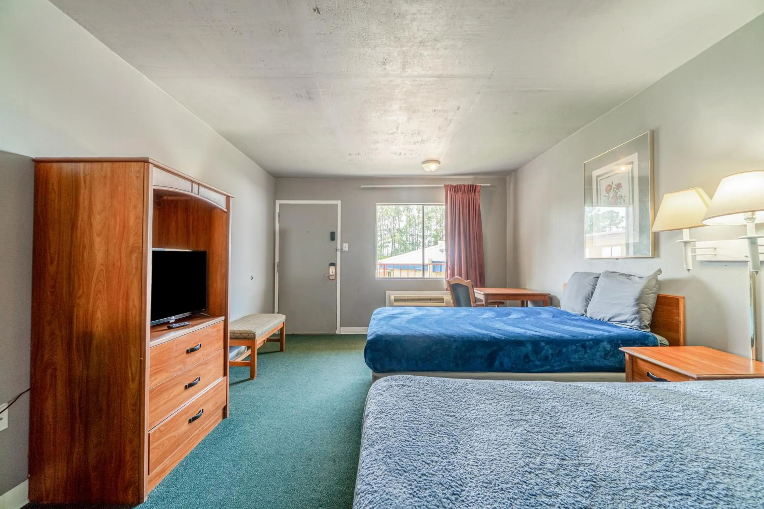 Bedroom, Bed in Economy Inn By OYO Livingston TX Hwy 59