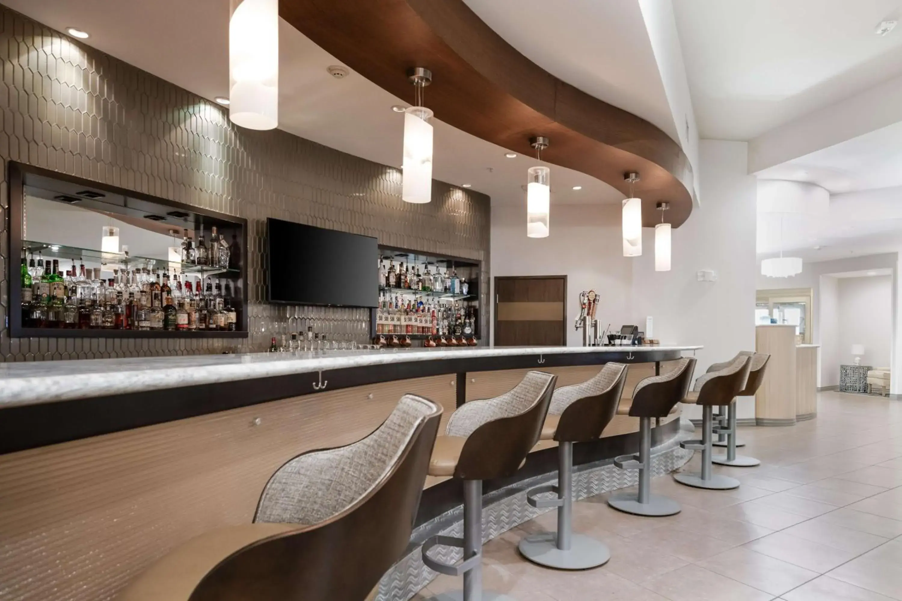 Lounge or bar in Best Western Premier Bryan College Station Lounge or bar in Best Western Premier Bryan College Station