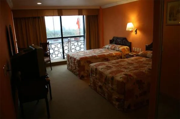 Photo of the whole room, Bed in Grand Royal Tampico
