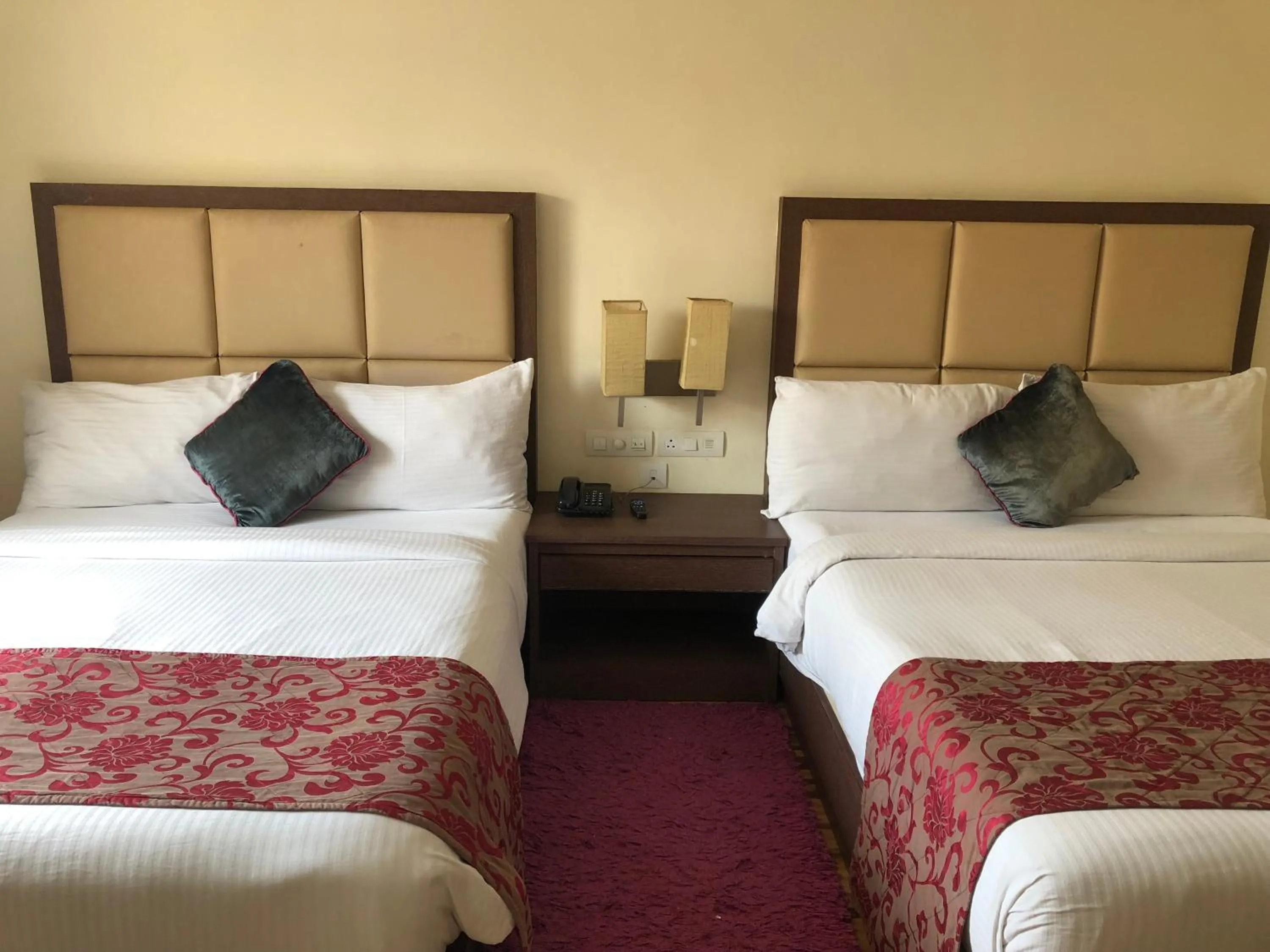 Bed in The Chariot Resort and Spa