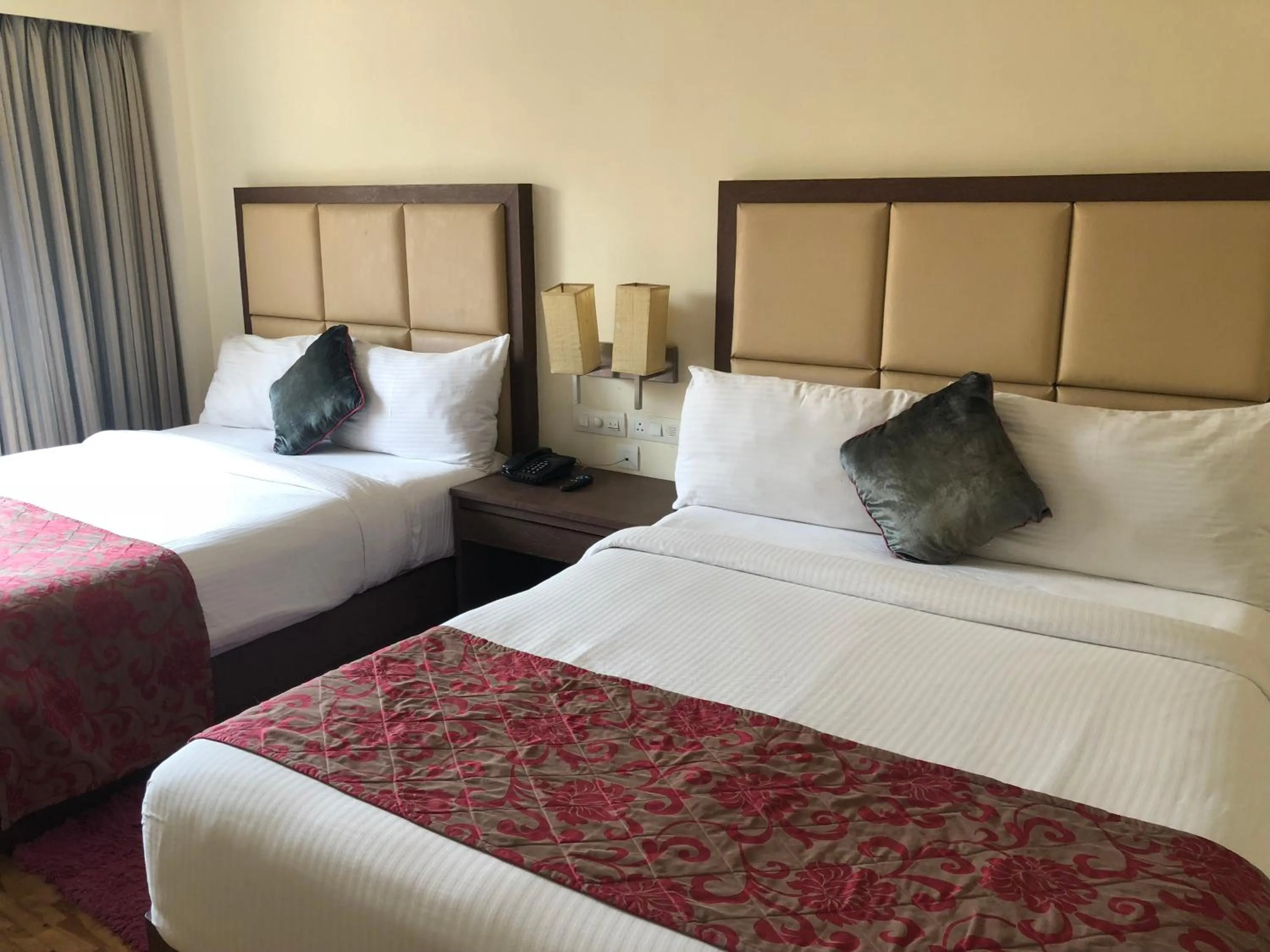 Bed in The Chariot Resort and Spa