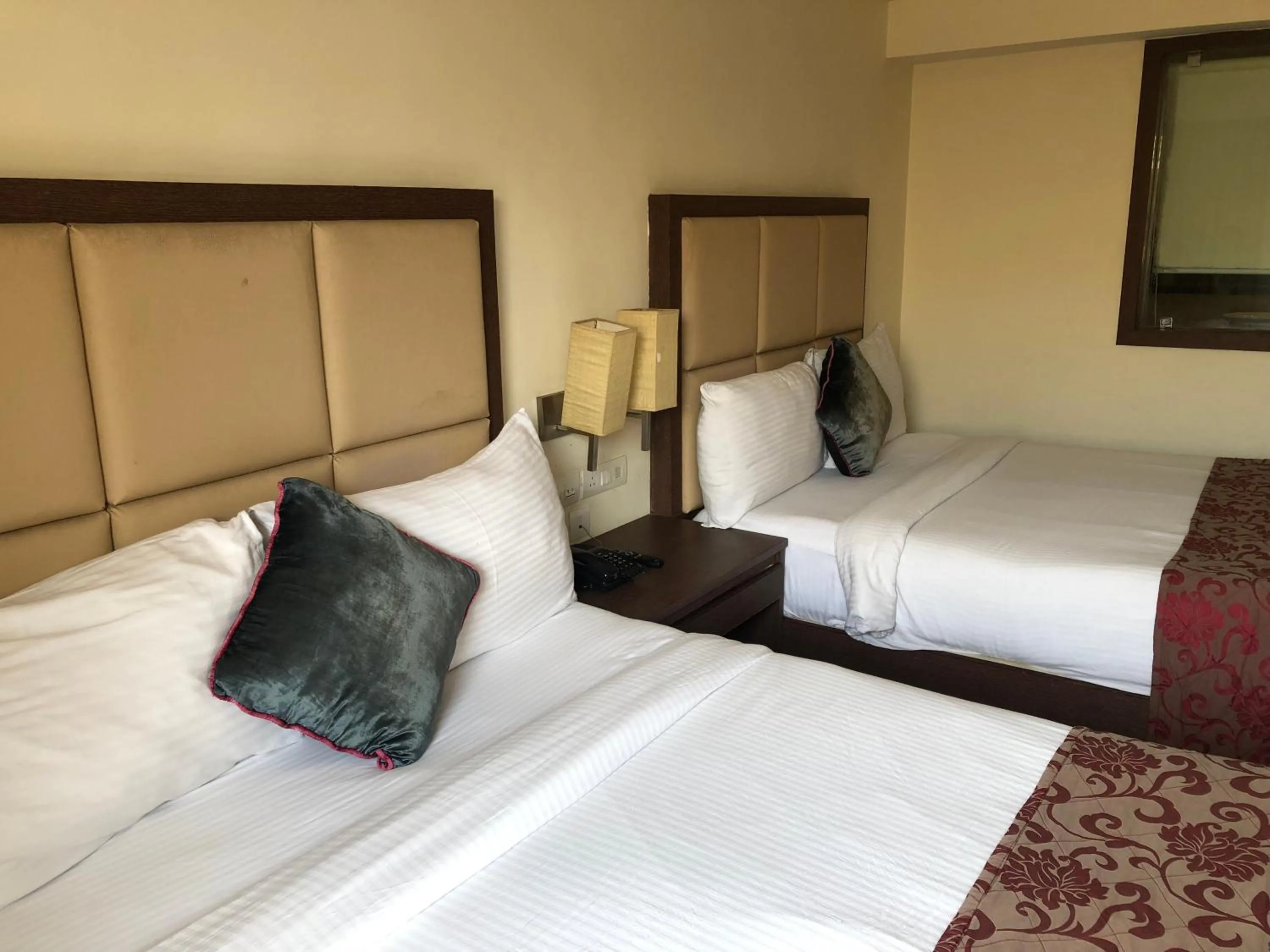 Bed in The Chariot Resort and Spa