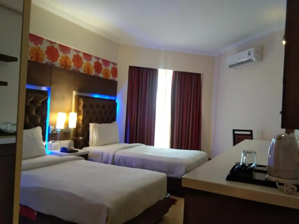 Bed in The Chariot Resort and Spa