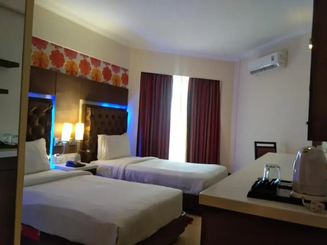 Bed in The Chariot Resort and Spa Bed in The Chariot Resort and Spa