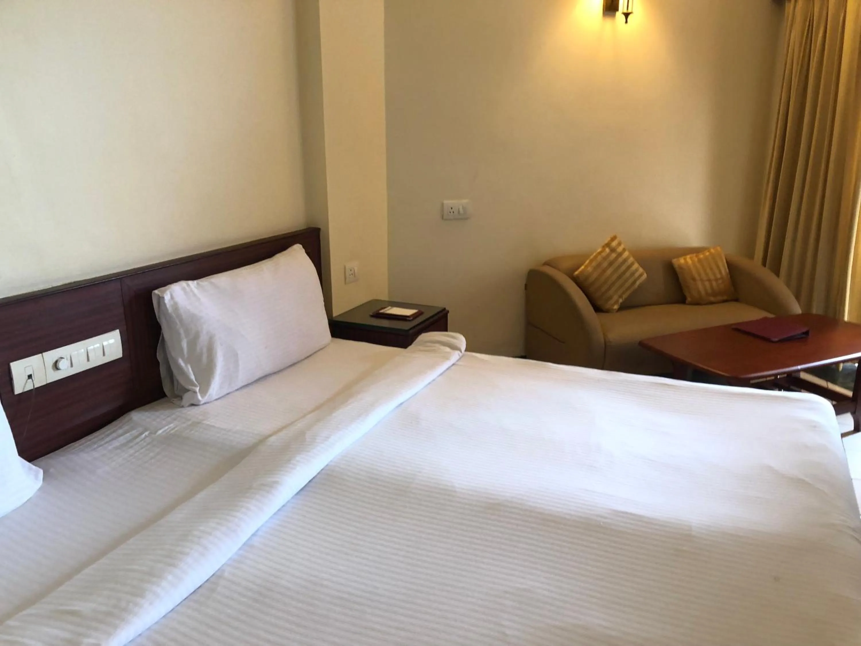 Bed in The Chariot Resort and Spa