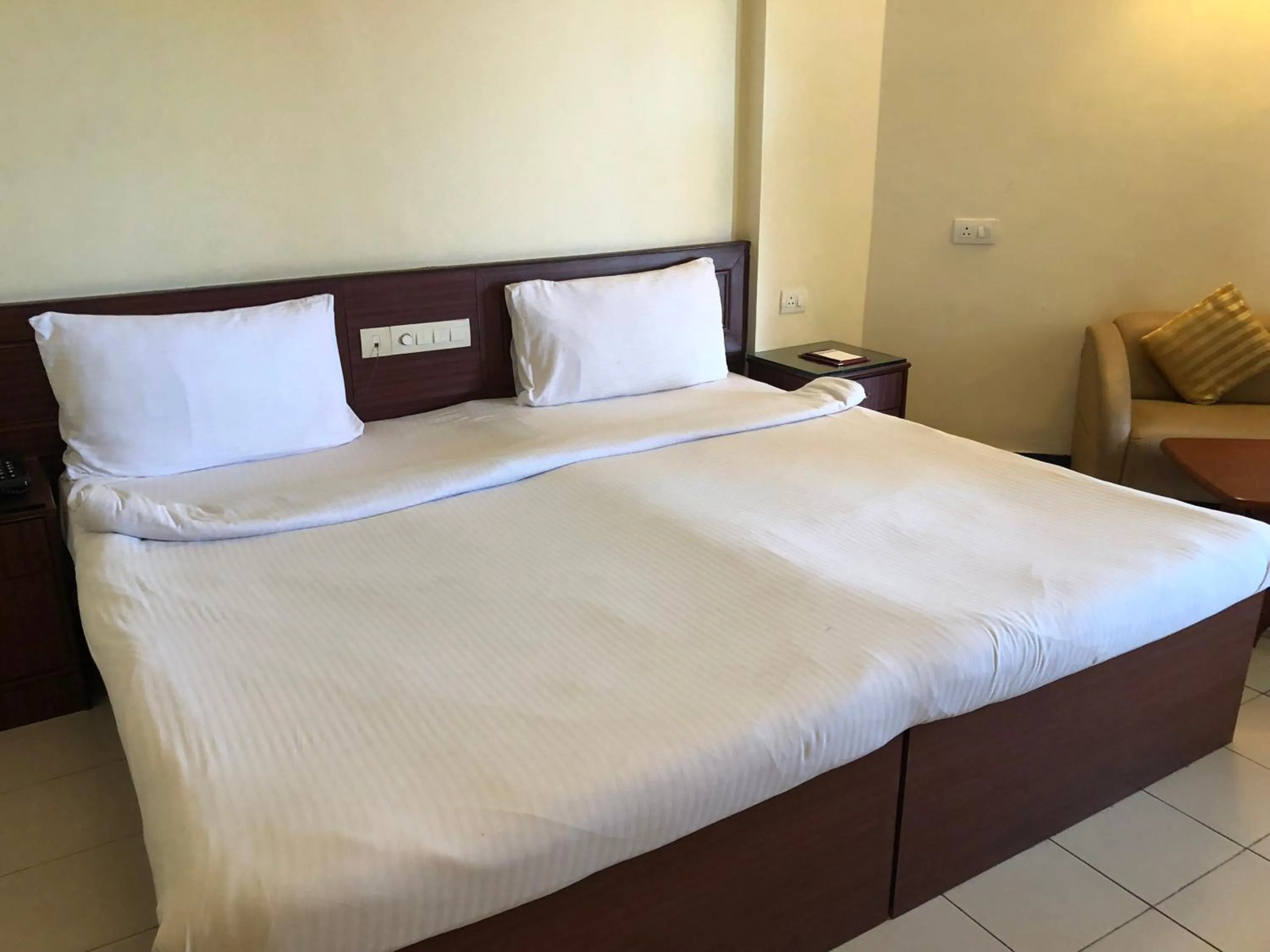 Bed in The Chariot Resort and Spa