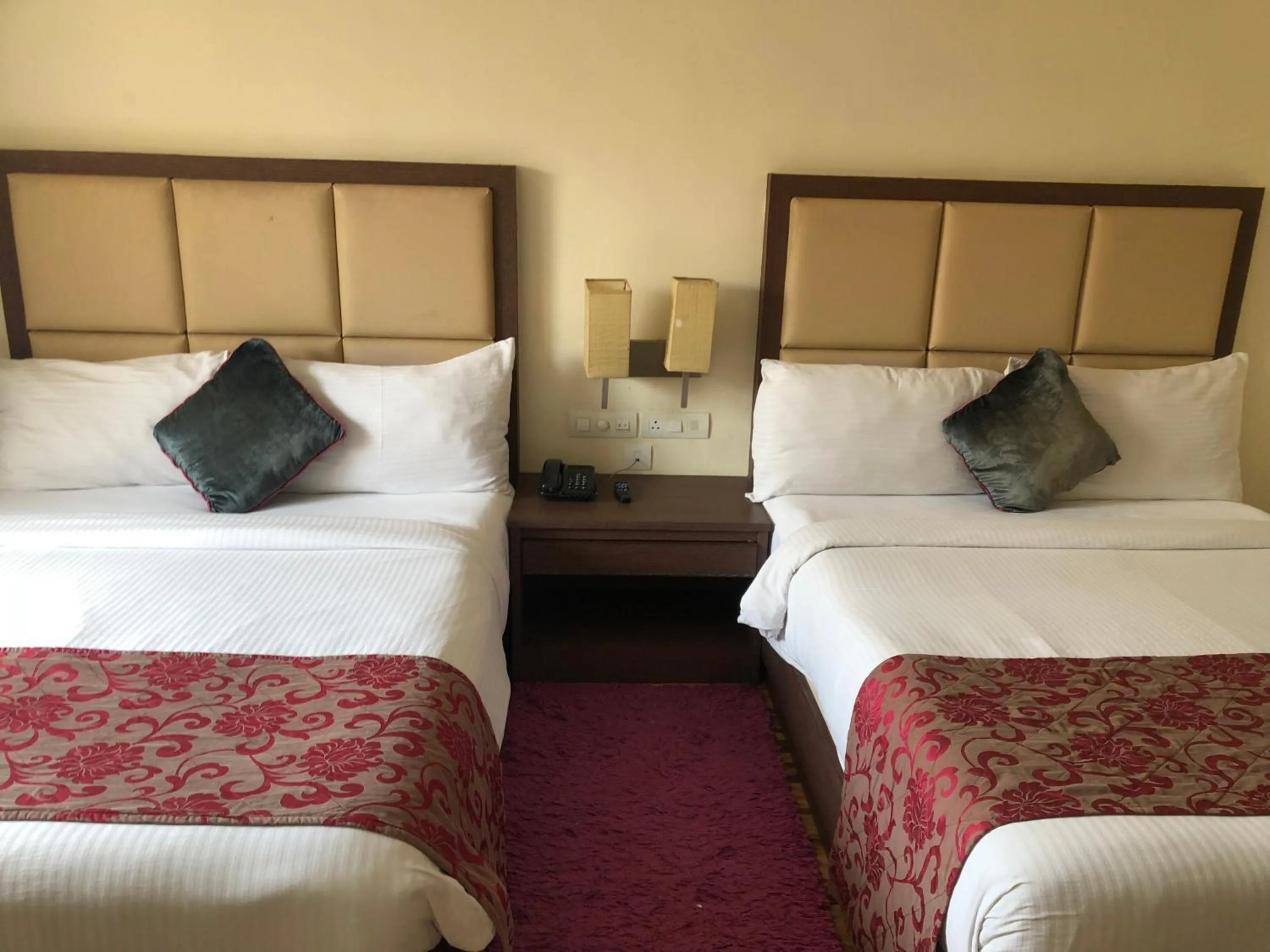 Bed in The Chariot Resort and Spa