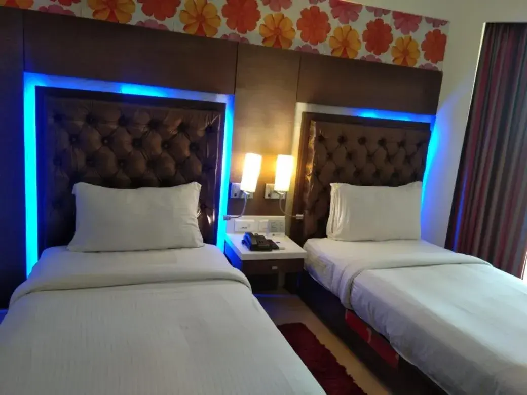 Bed in The Chariot Resort and Spa Bed in The Chariot Resort and Spa