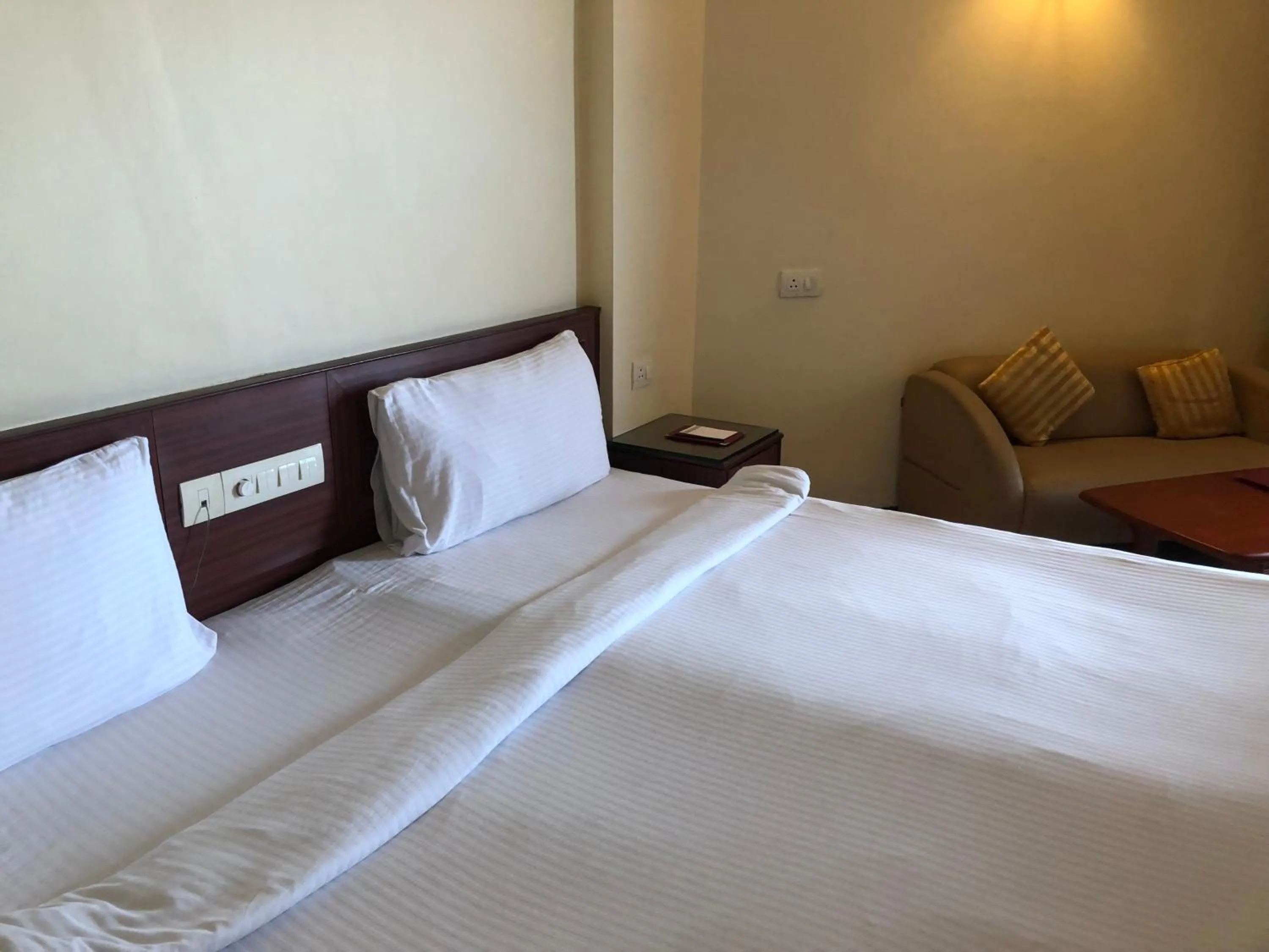 Bed in The Chariot Resort and Spa