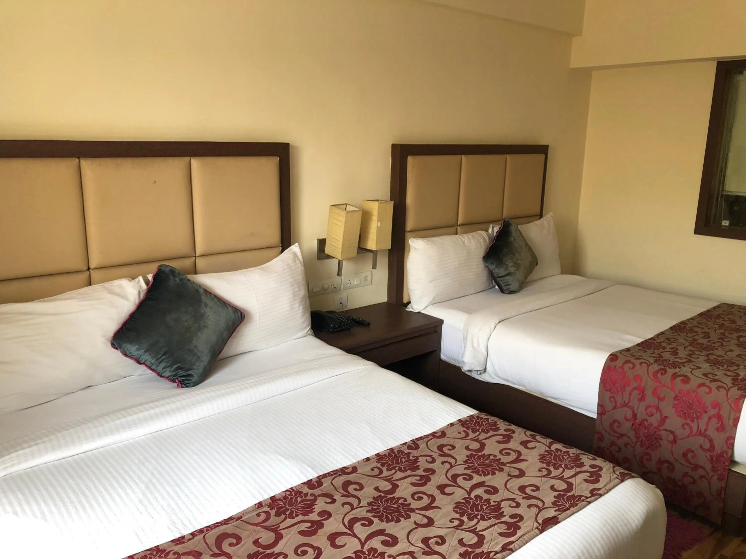 Bed in The Chariot Resort and Spa