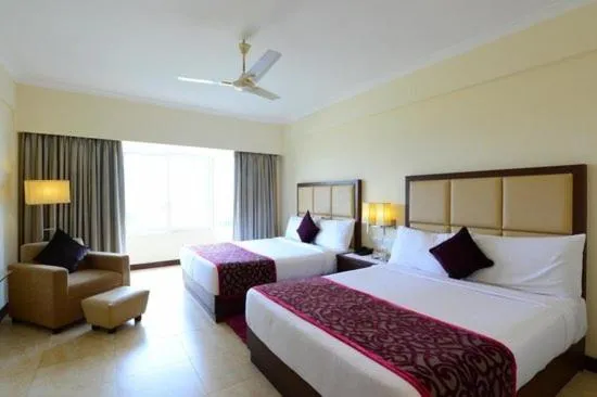 Bed in The Chariot Resort and Spa