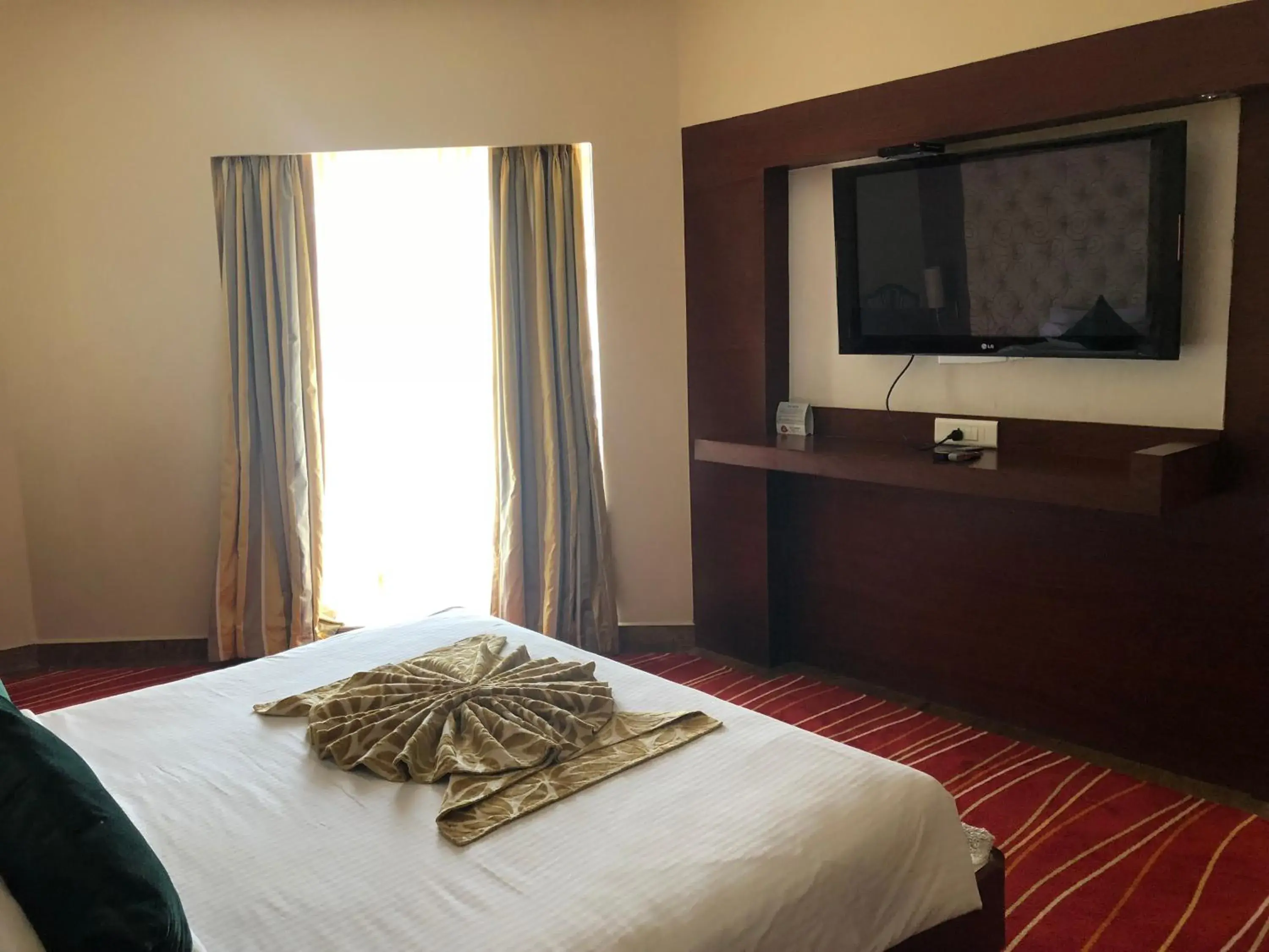 Bed in The Chariot Resort and Spa Bed in The Chariot Resort and Spa