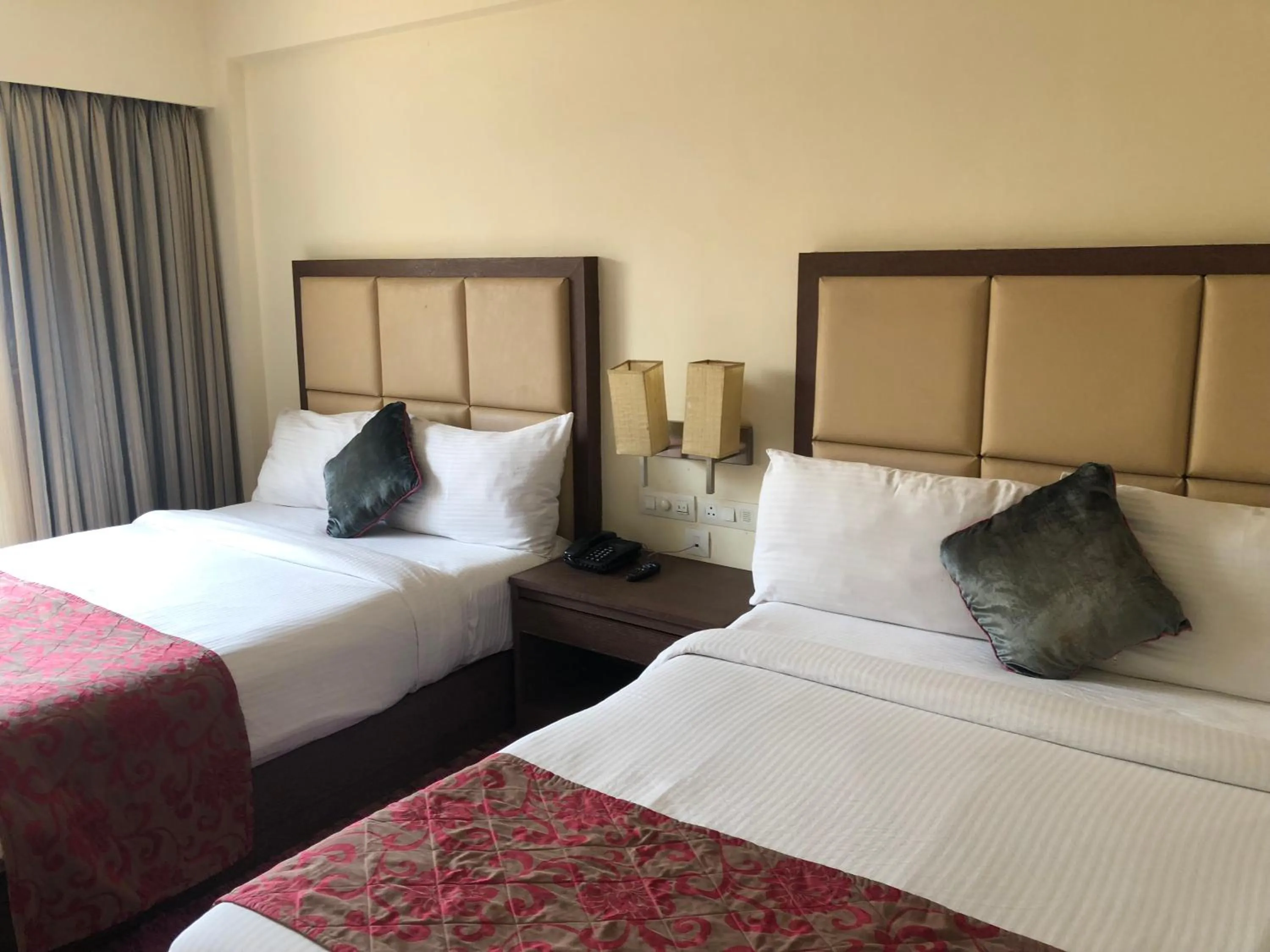 Bed in The Chariot Resort and Spa