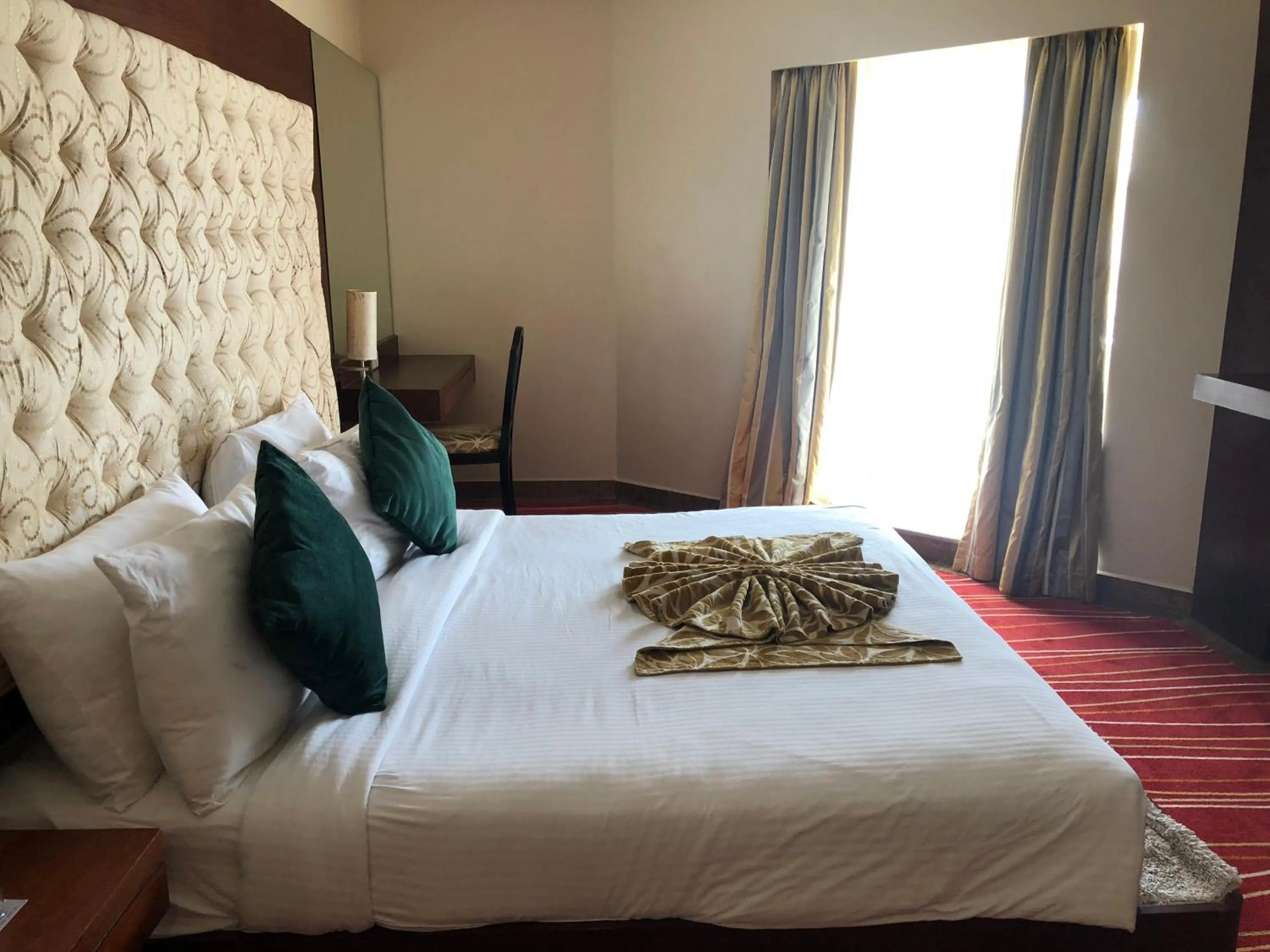 Bed in The Chariot Resort and Spa