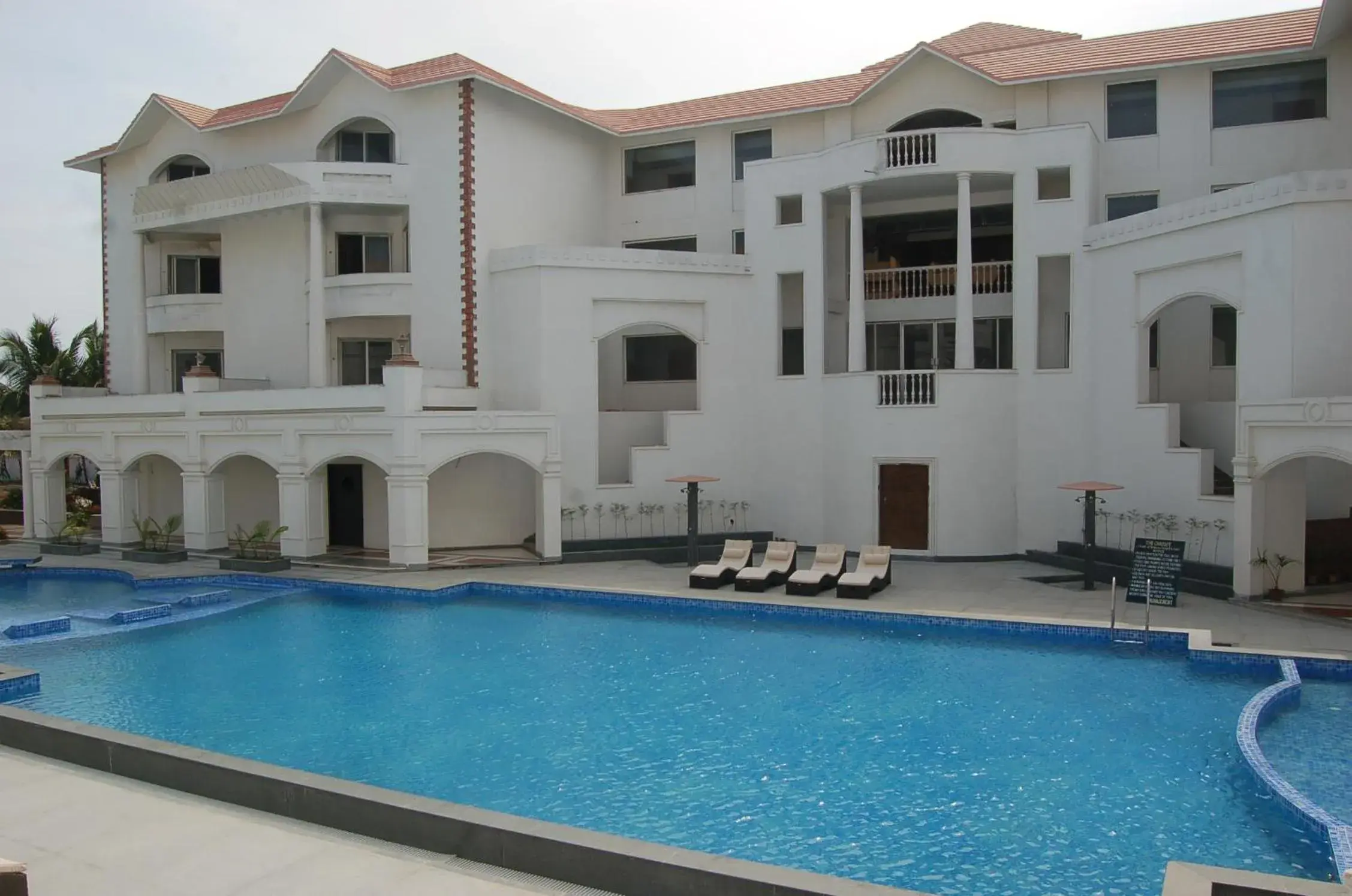 Swimming pool in The Chariot Resort and Spa Swimming pool in The Chariot Resort and Spa