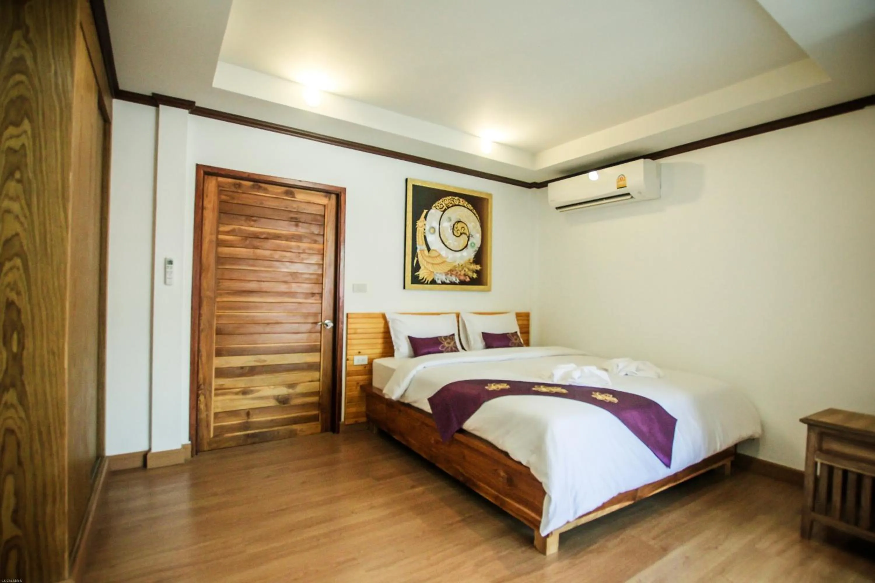 Bed in The Villager Fishermans Village