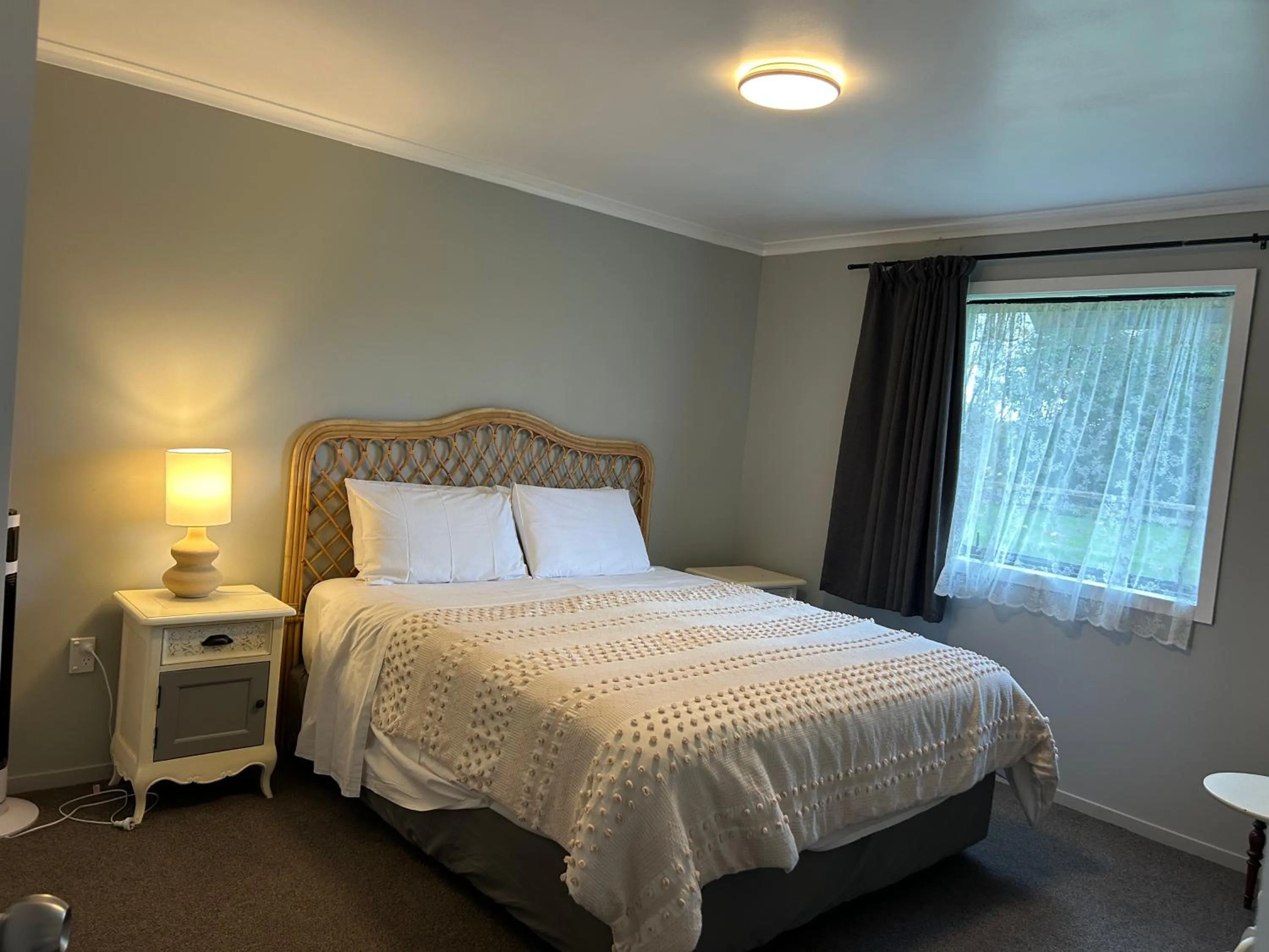 Bed in Mystery Creek Motel