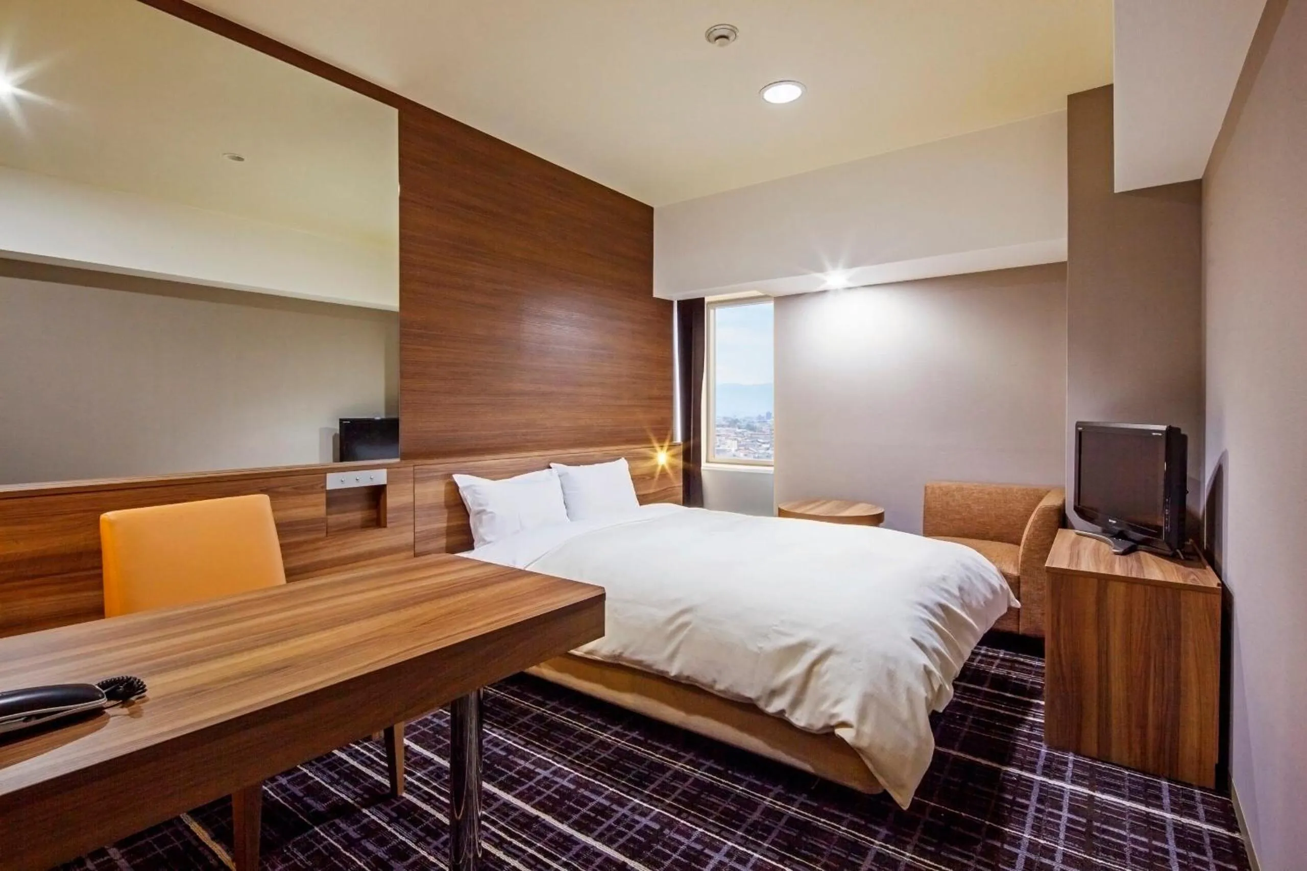 Bed in Kofu Kinenbi Hotel