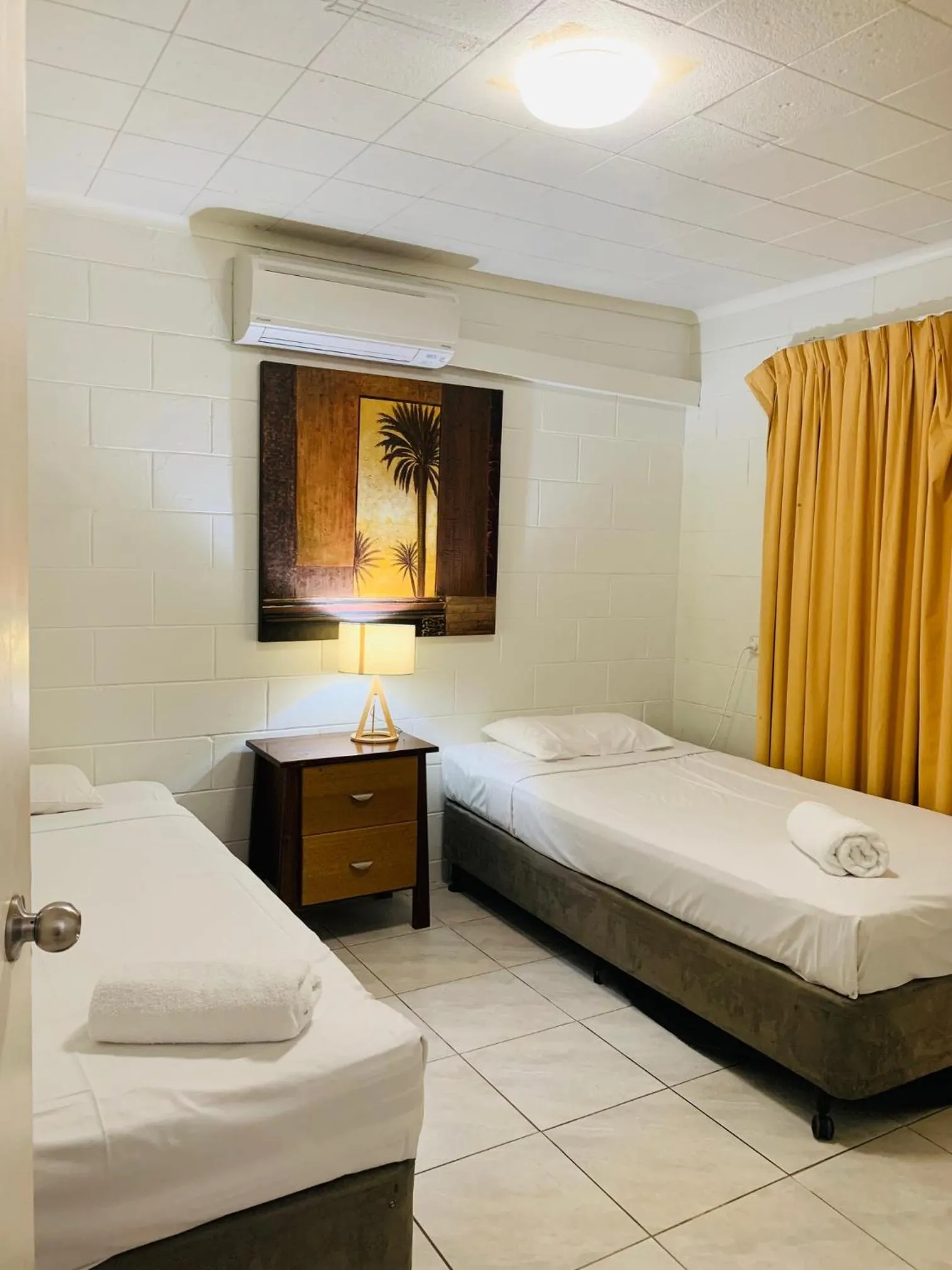 Bed in Airlie Beach Apartments