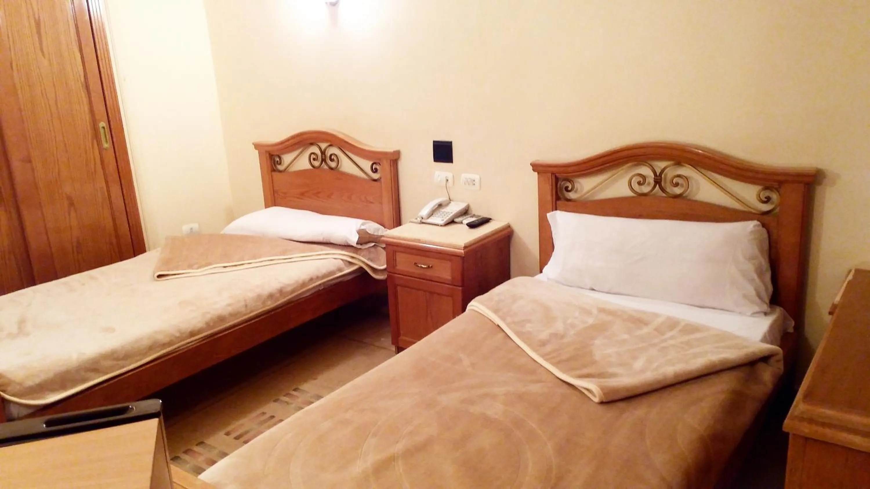 Bed in Applicators Hotel