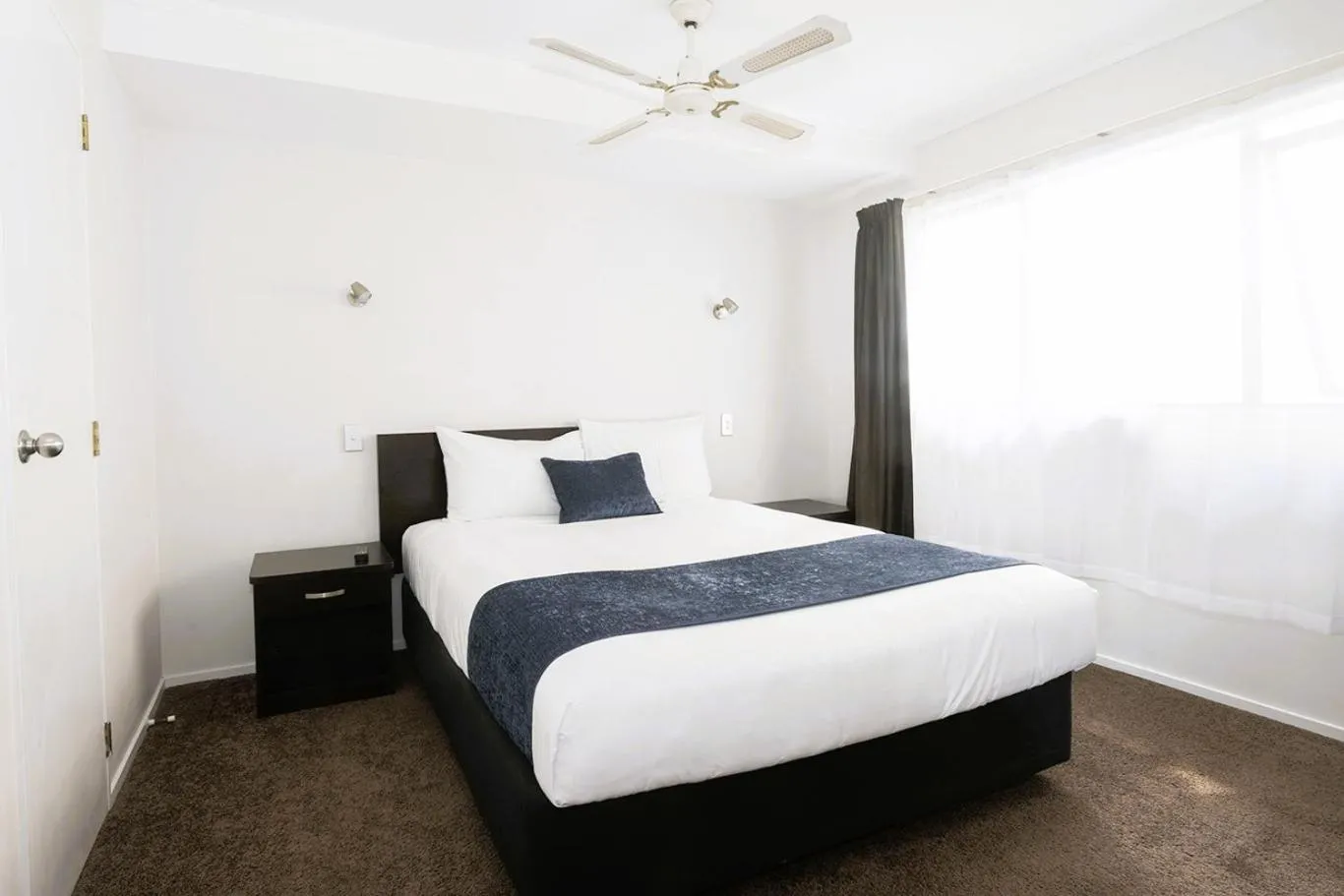 Bed in Aquarius Motor Inn