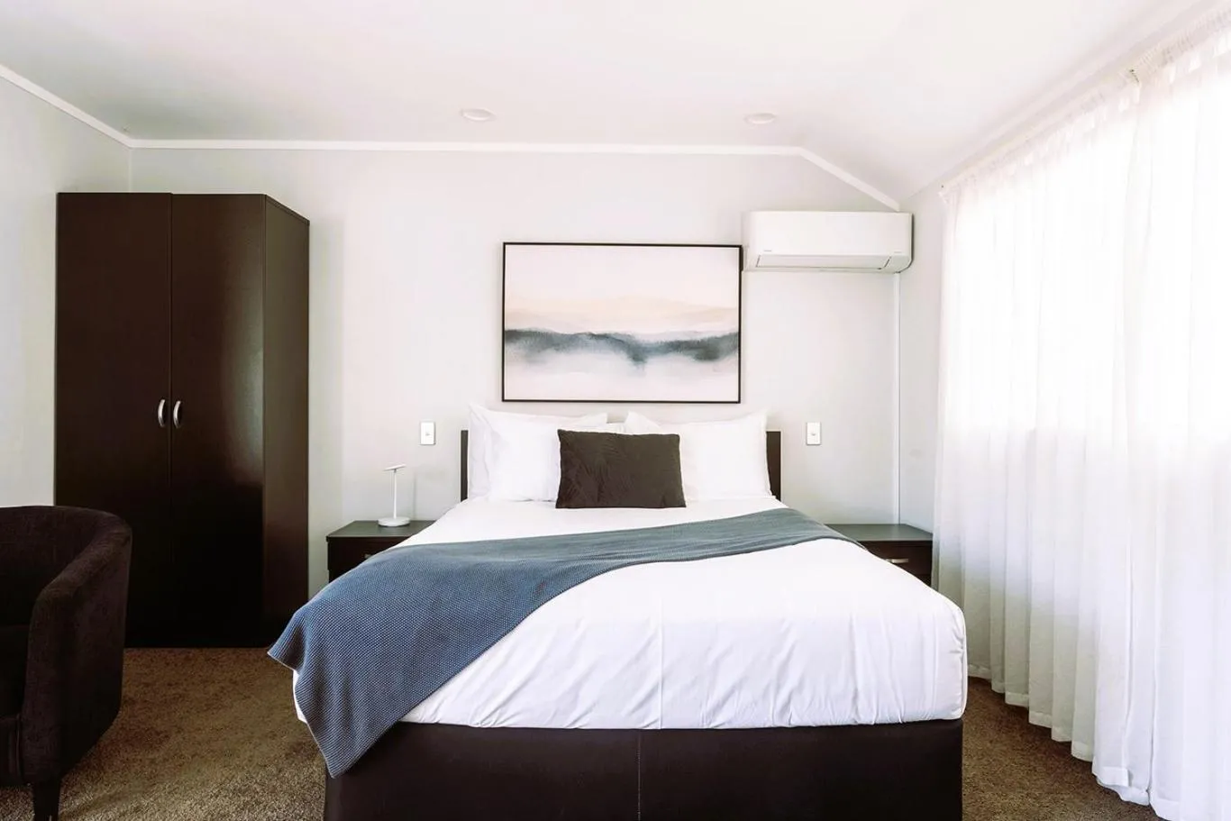 Bed in Aquarius Motor Inn