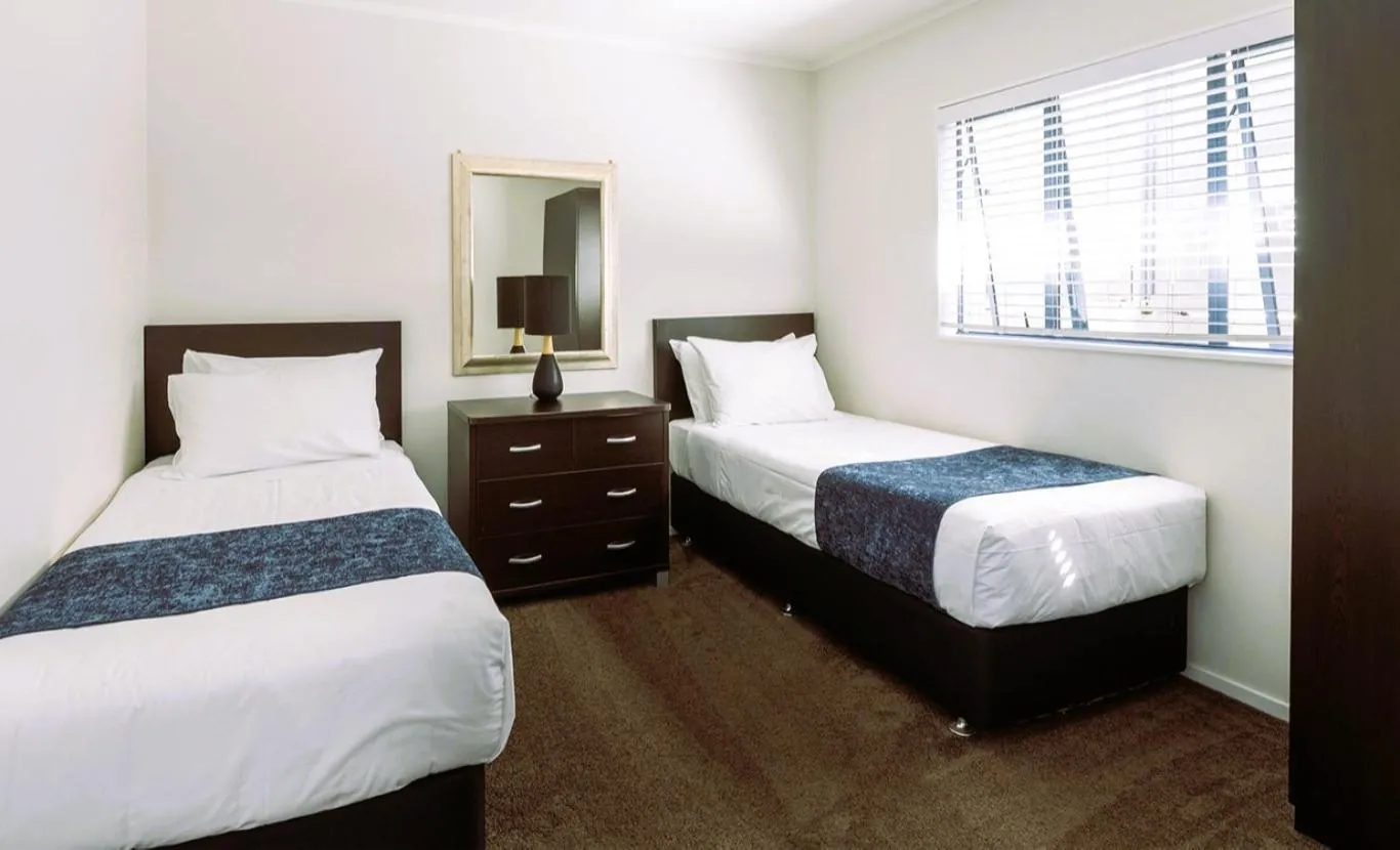 Bed in Aquarius Motor Inn