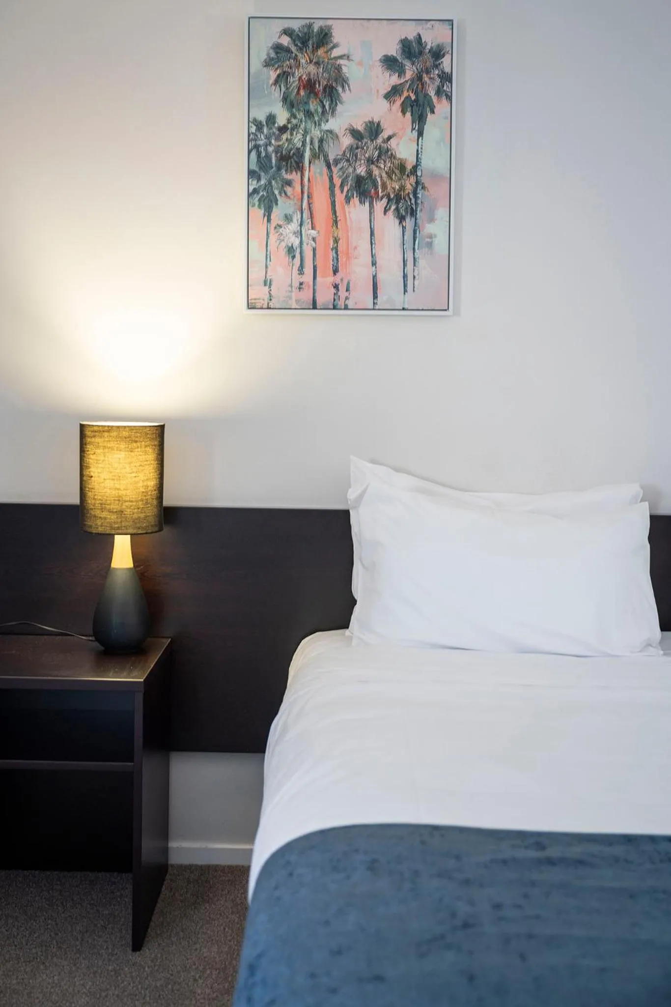 Bed in Aquarius Motor Inn