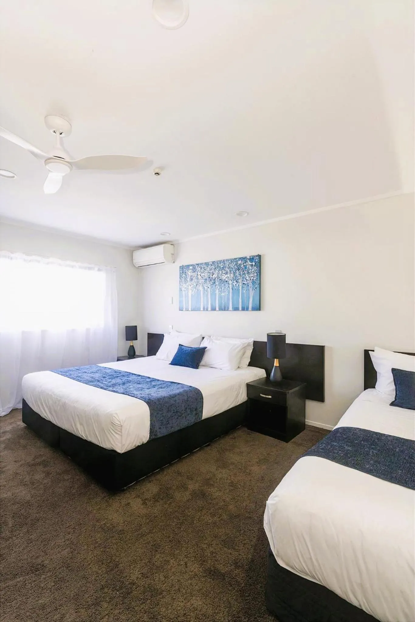 Bed in Aquarius Motor Inn