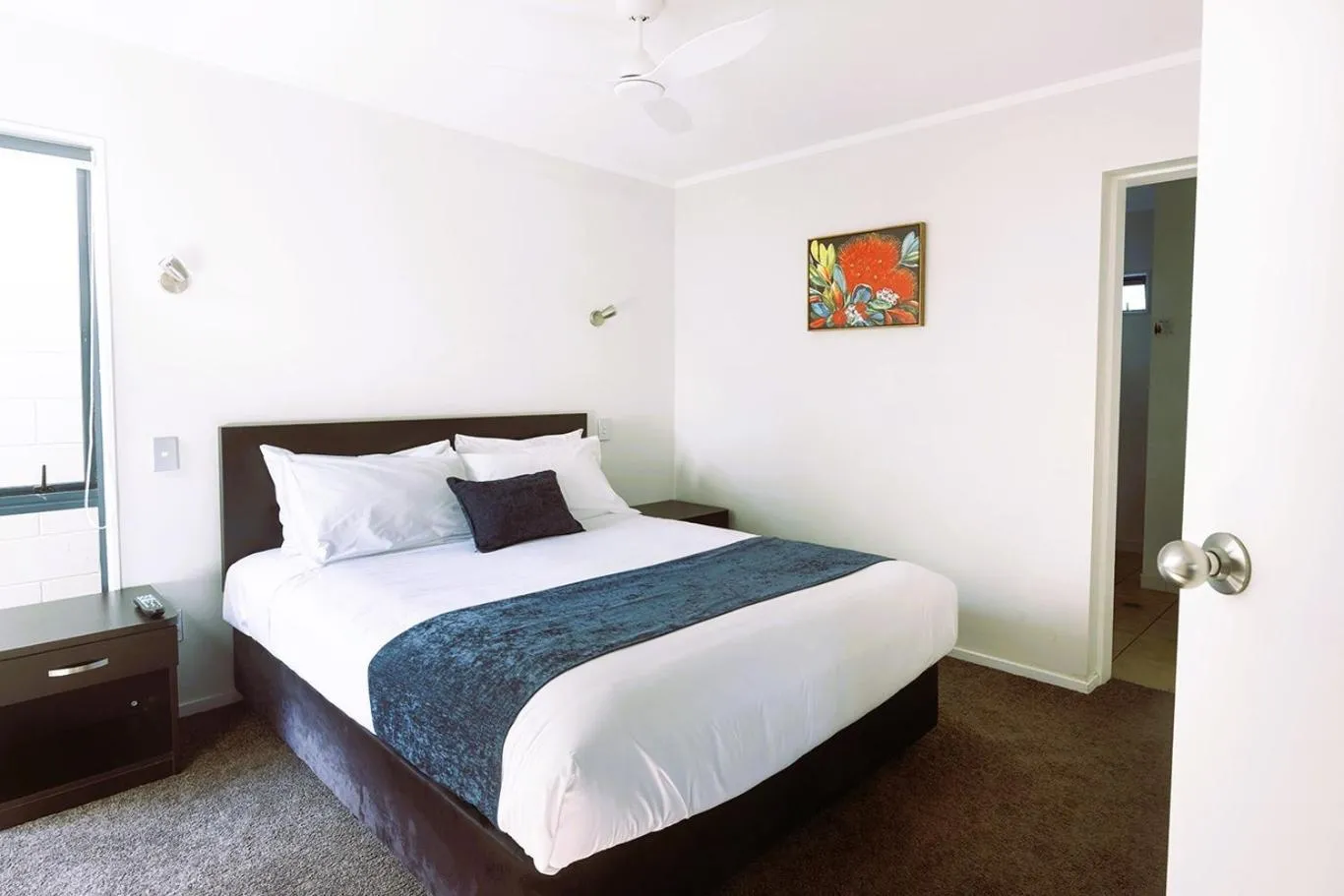 Bed in Aquarius Motor Inn