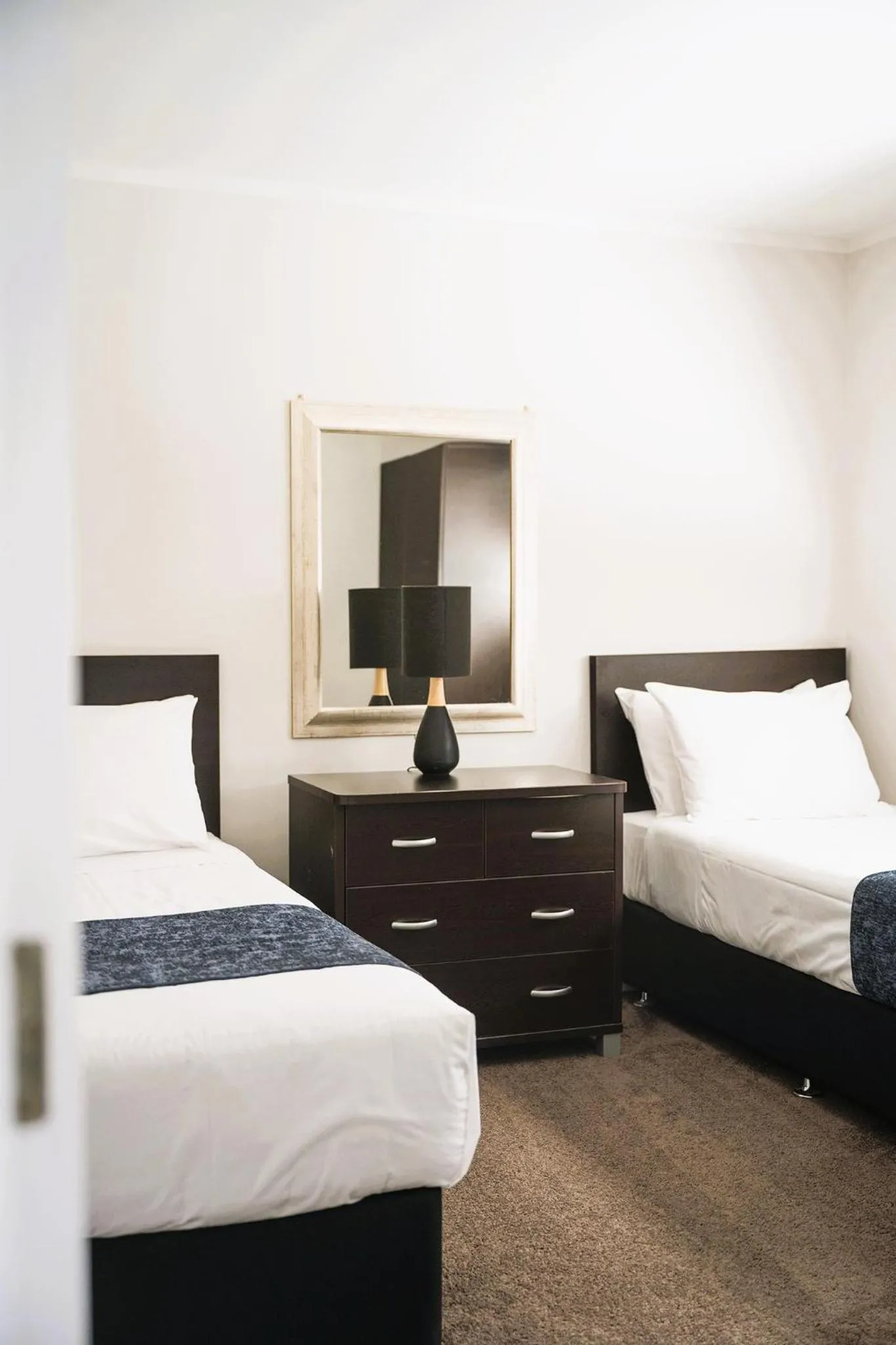 Bed in Aquarius Motor Inn