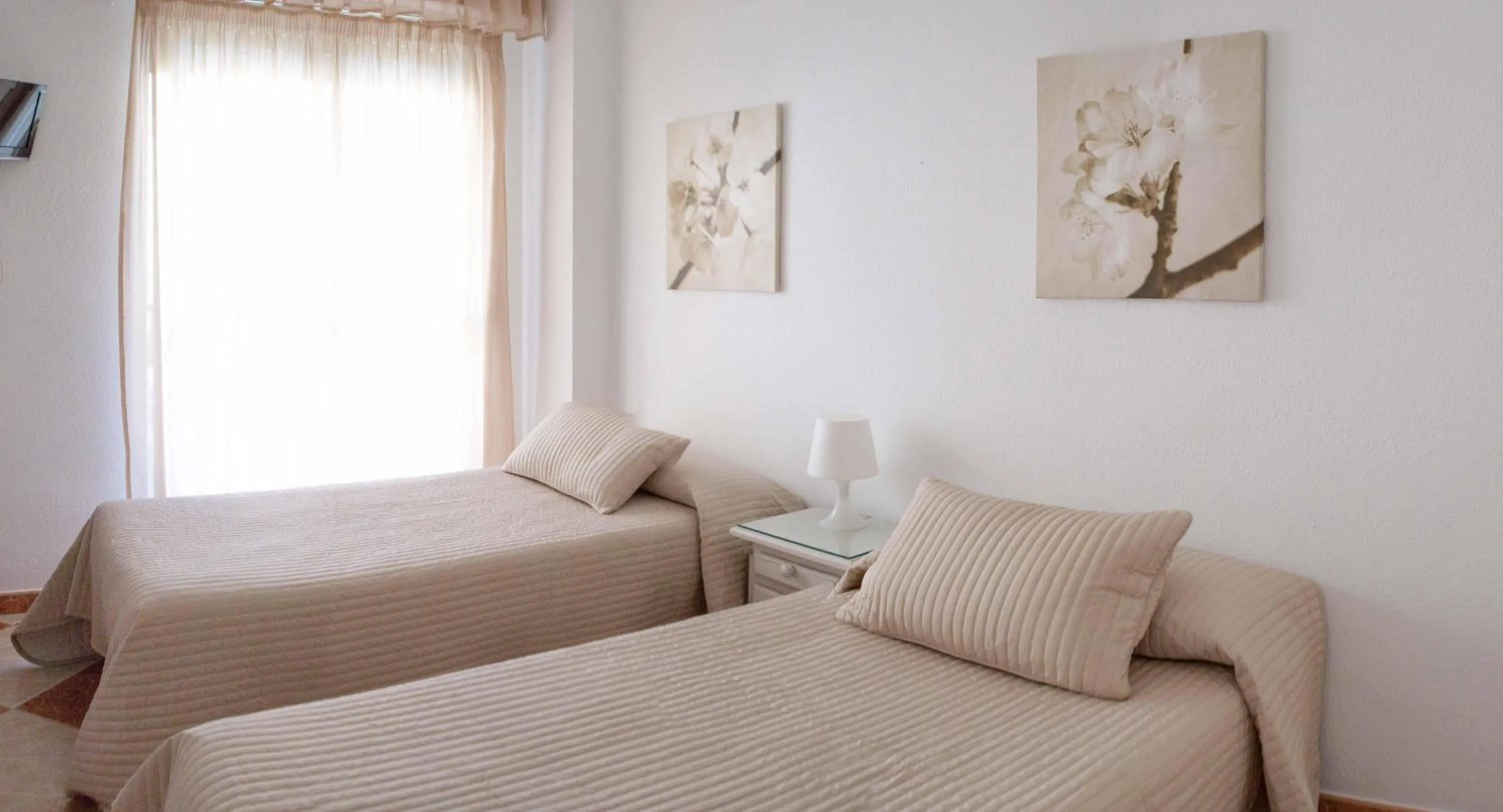 Photo of the whole room, Bed in Hostal Jomarijo