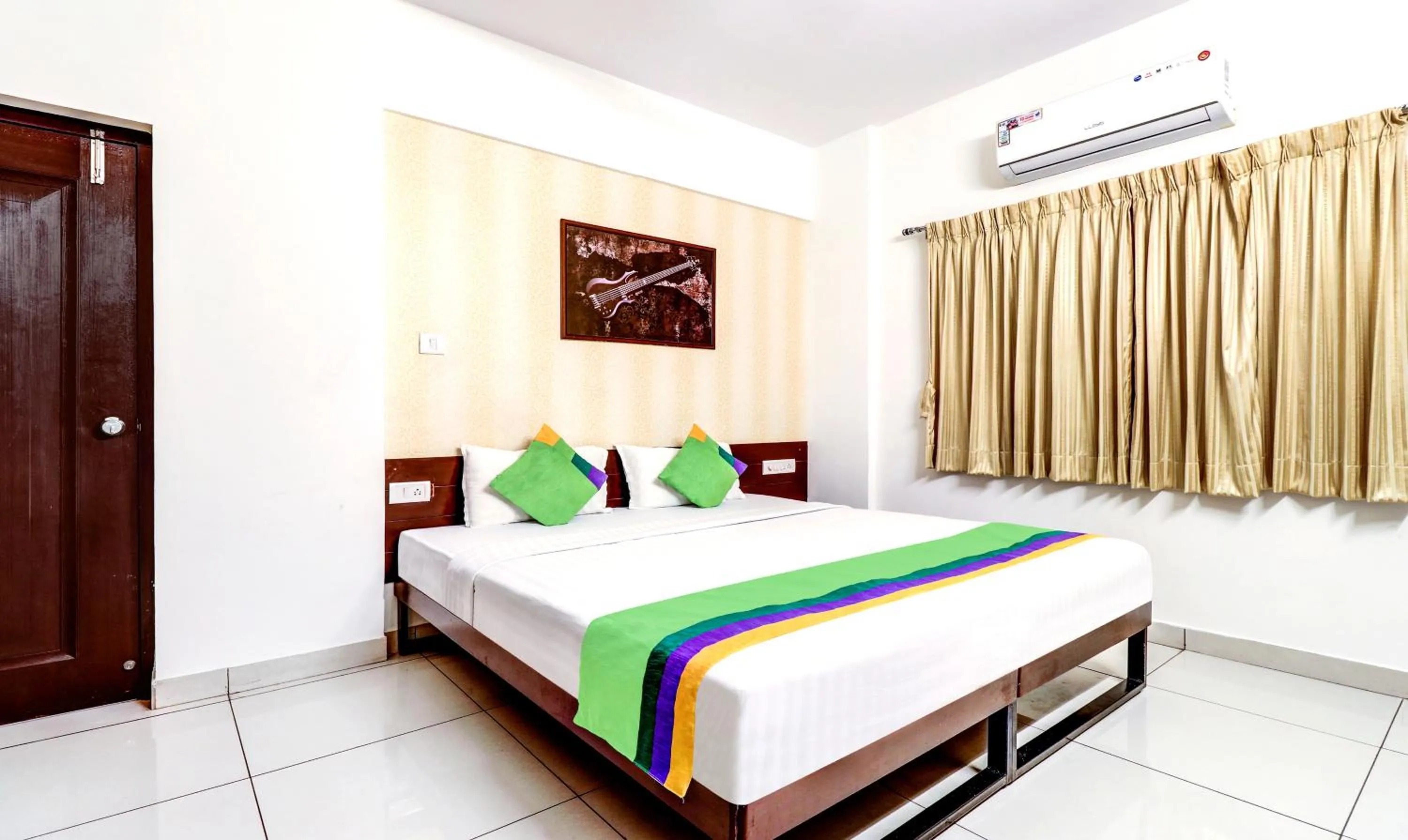 Bedroom, Bed in Treebo Saga Apartment