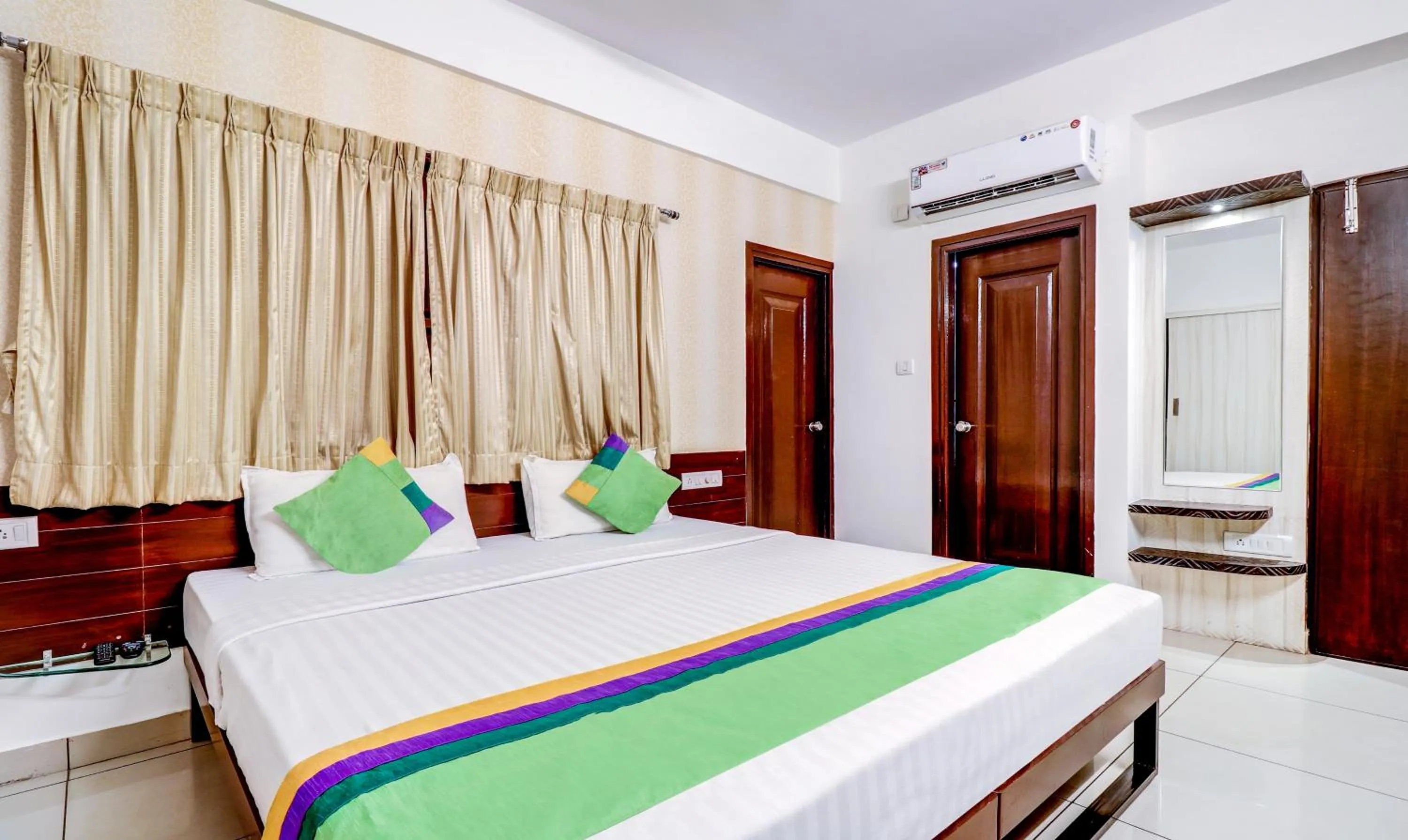 Bedroom, Bed in Treebo Saga Apartment