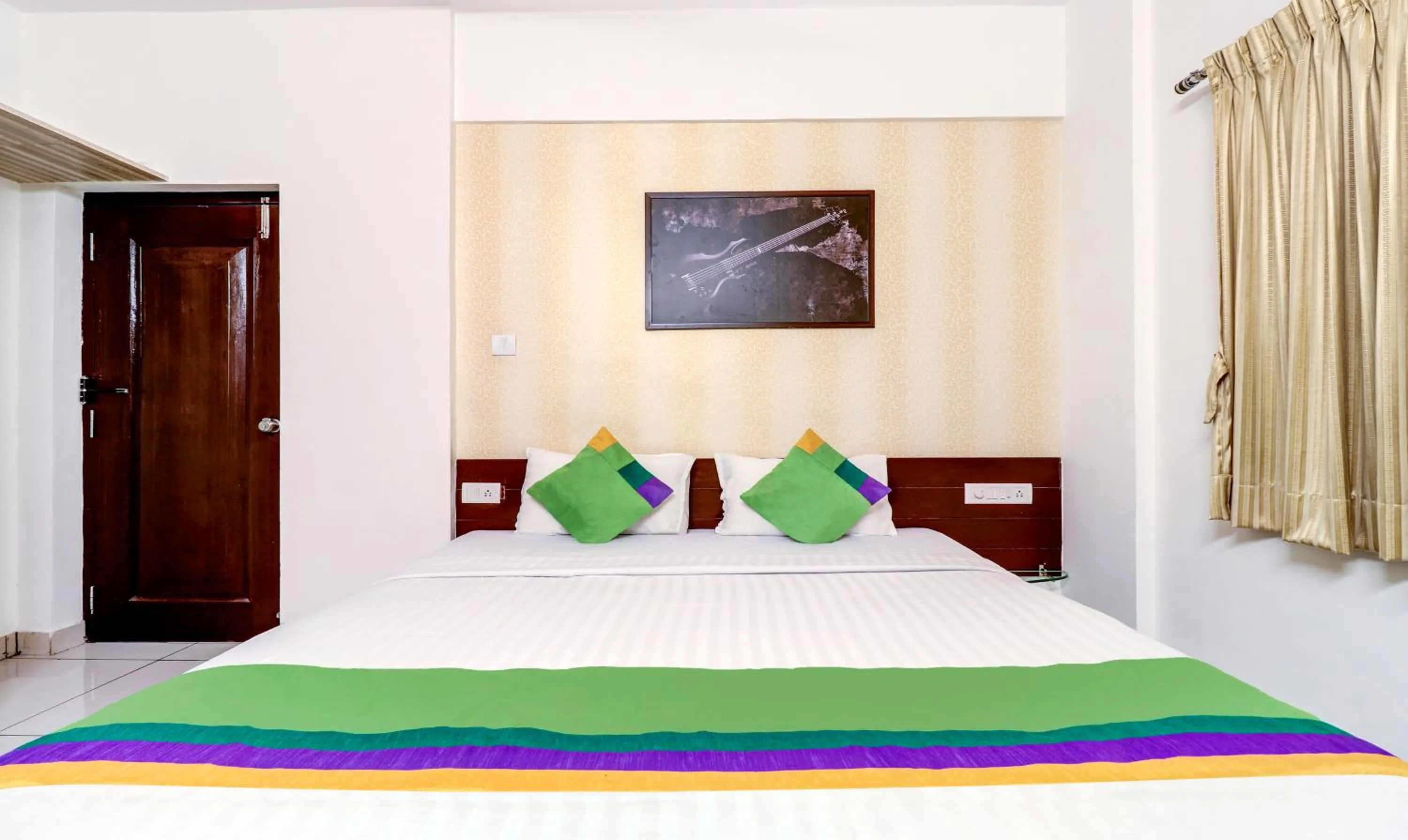 Bedroom, Bed in Treebo Saga Apartment