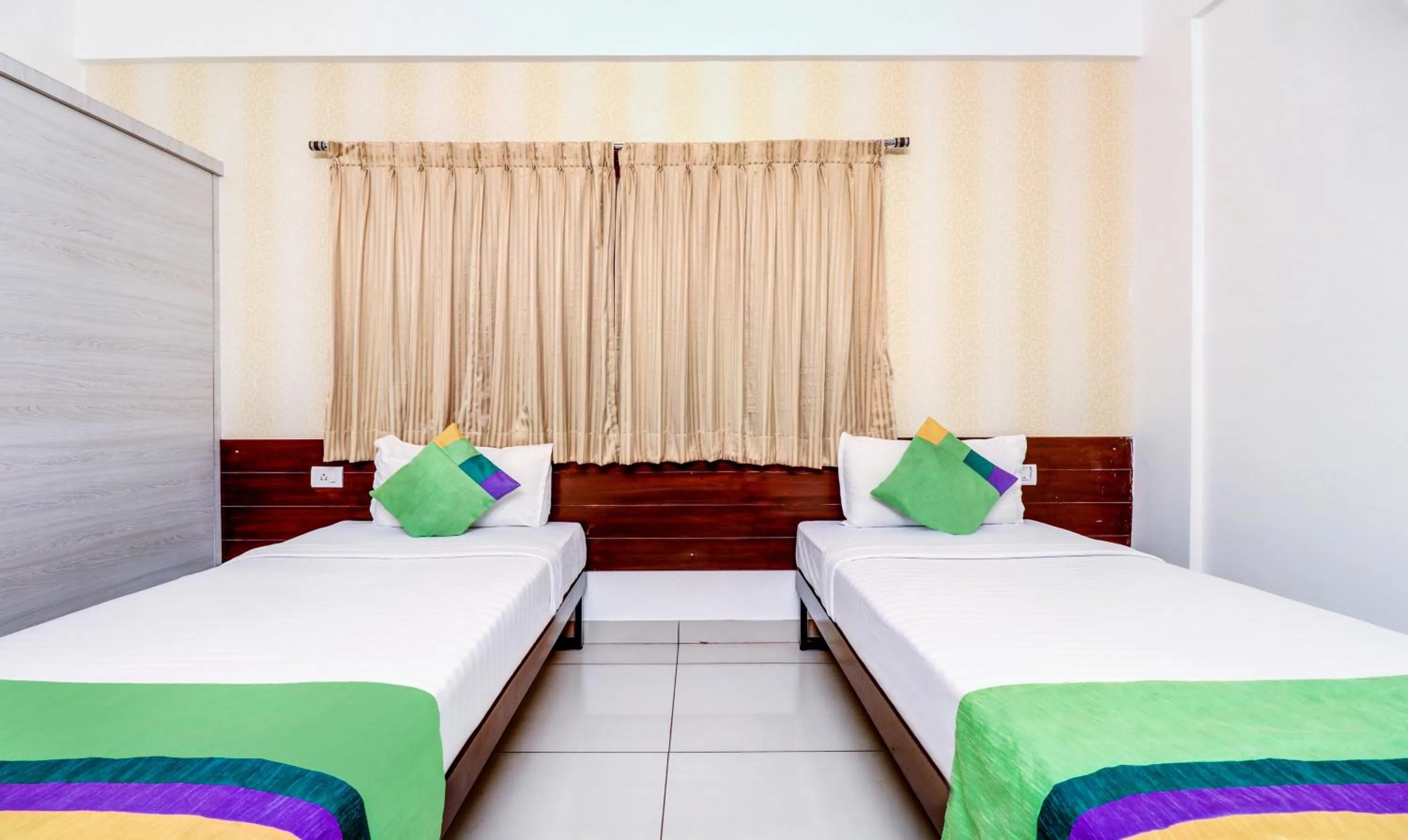 Bedroom, Bed in Treebo Saga Apartment