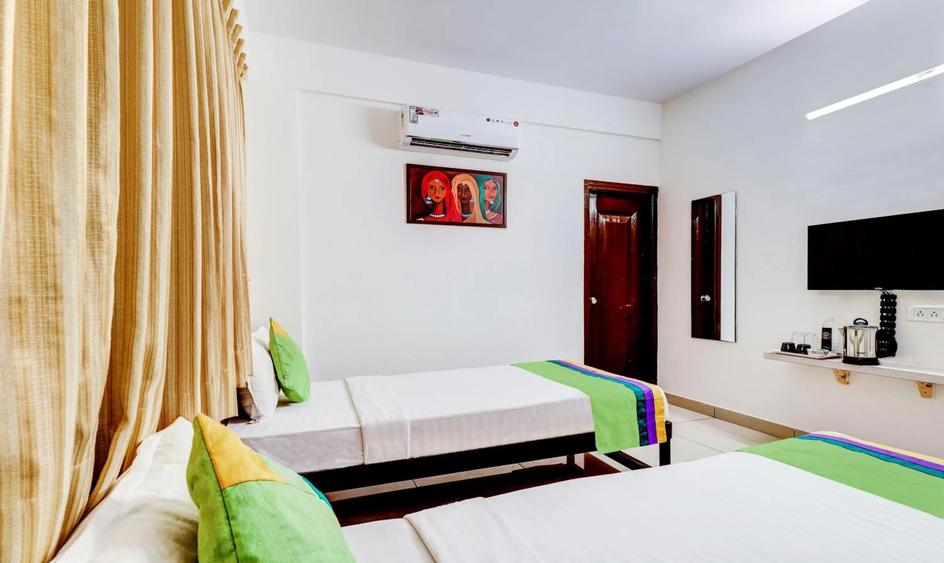 Bedroom, Bed in Treebo Saga Apartment