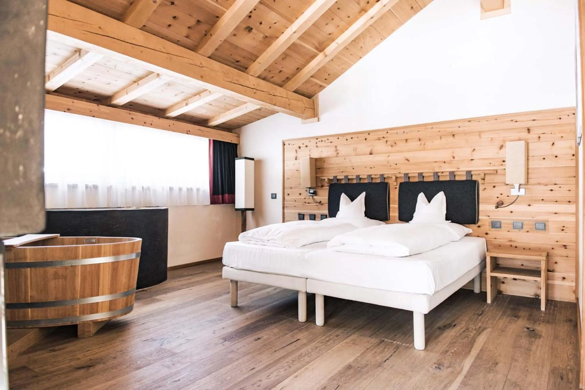 Photo of the whole room, Bed in Dolomites Living Hotel Tirler