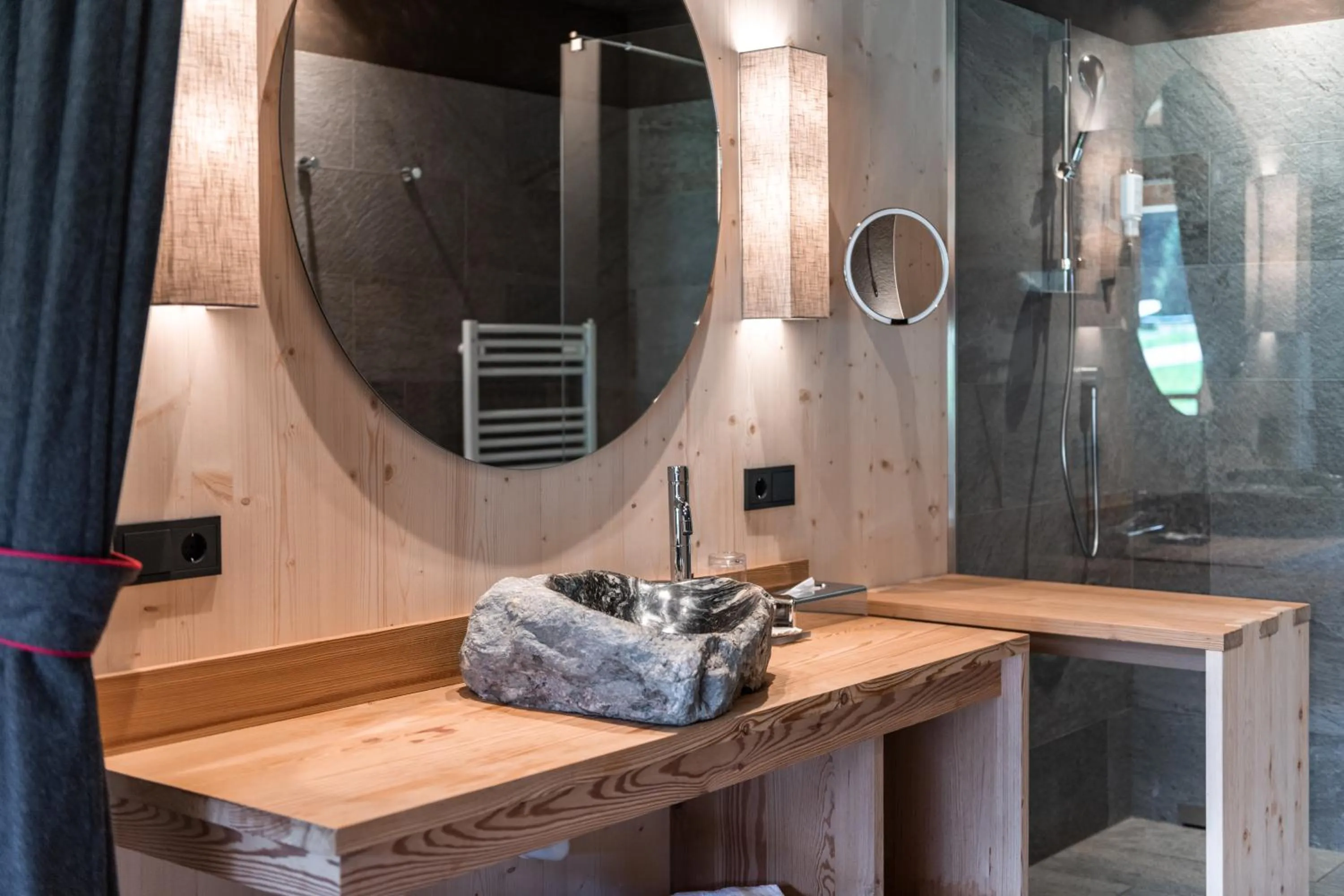Bathroom in Dolomites Living Hotel Tirler
