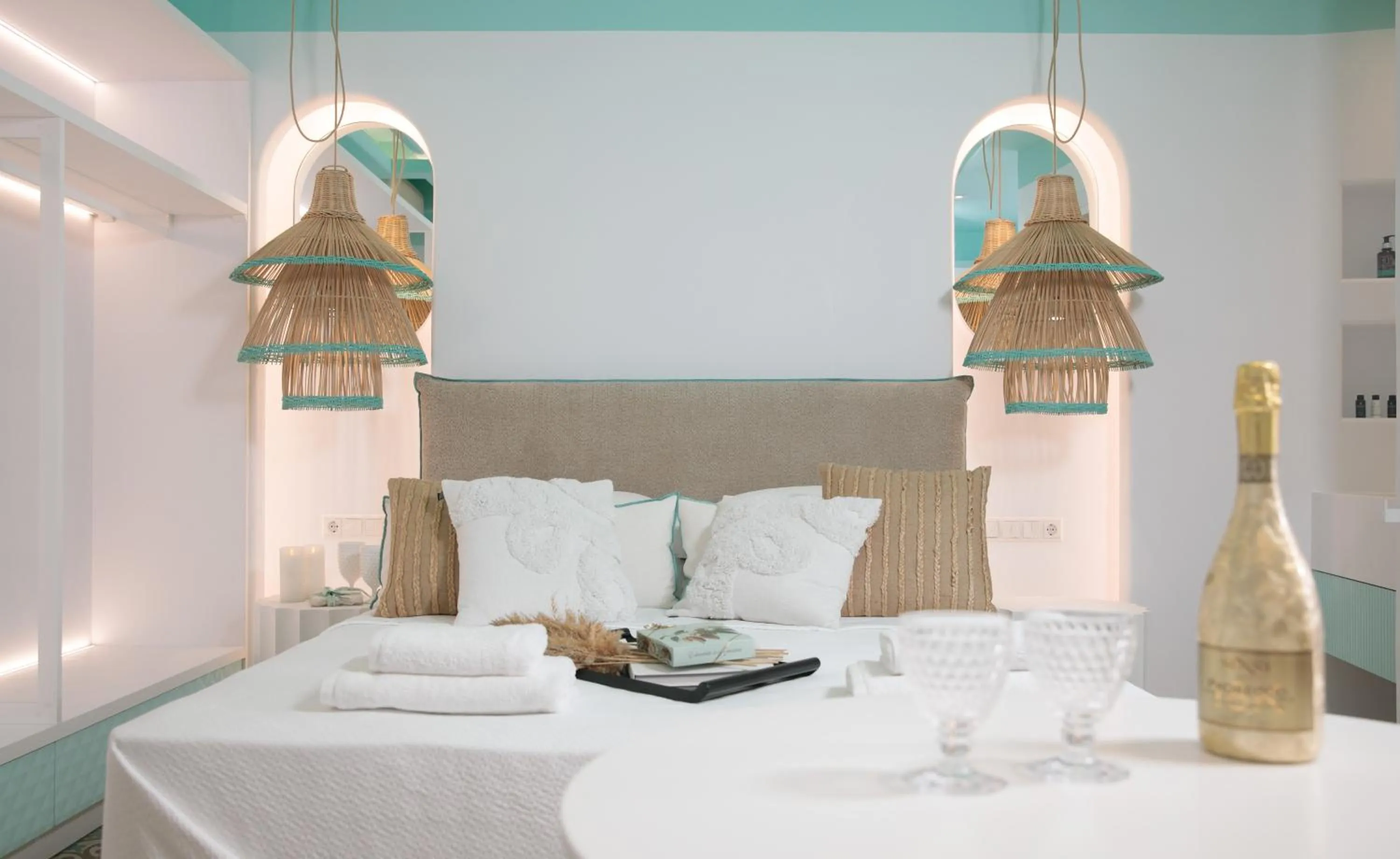 Bed in Flora Apartments & Studios