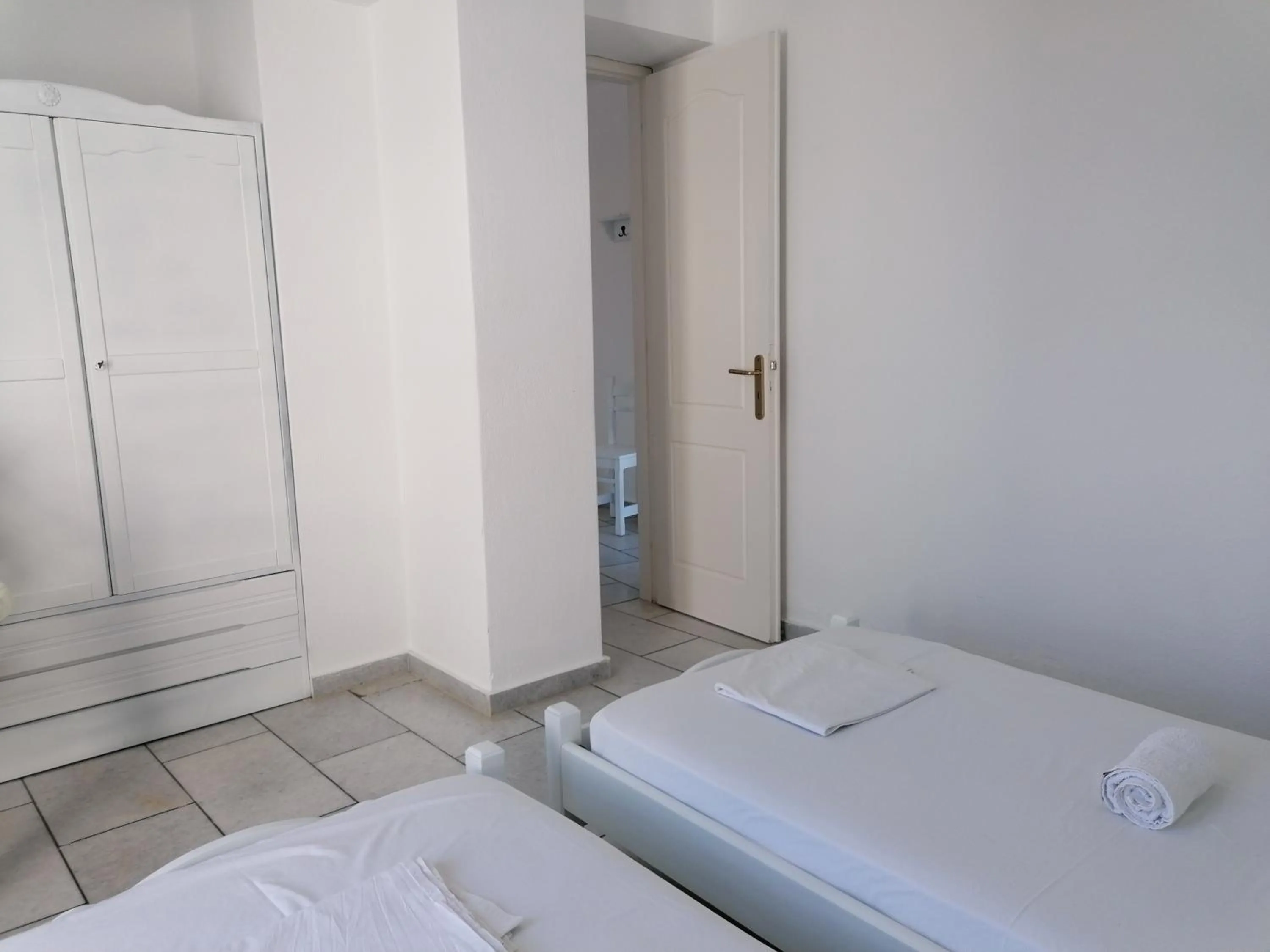 Photo of the whole room, Bed in Flora Apartments & Studios