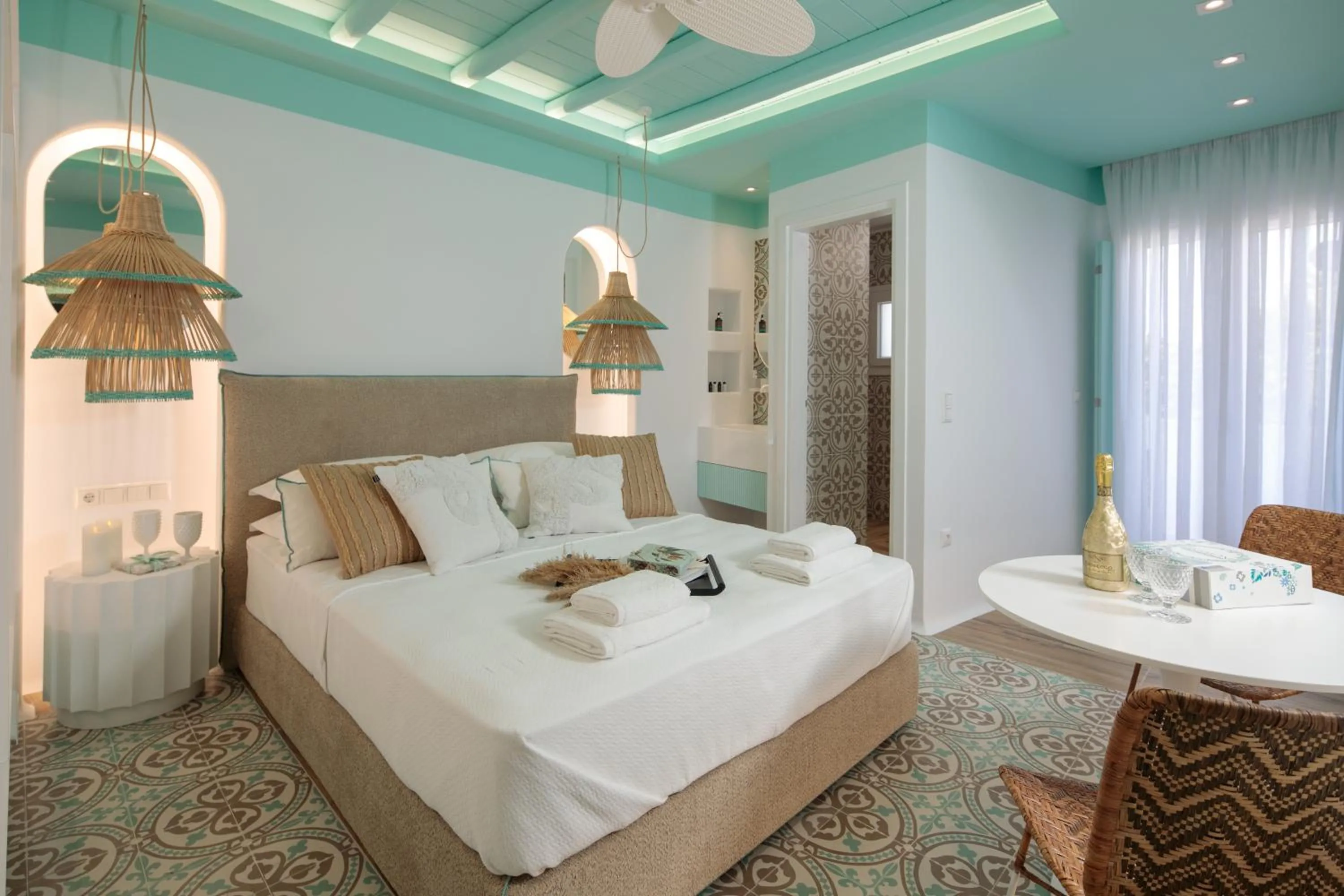 Bed in Flora Apartments & Studios