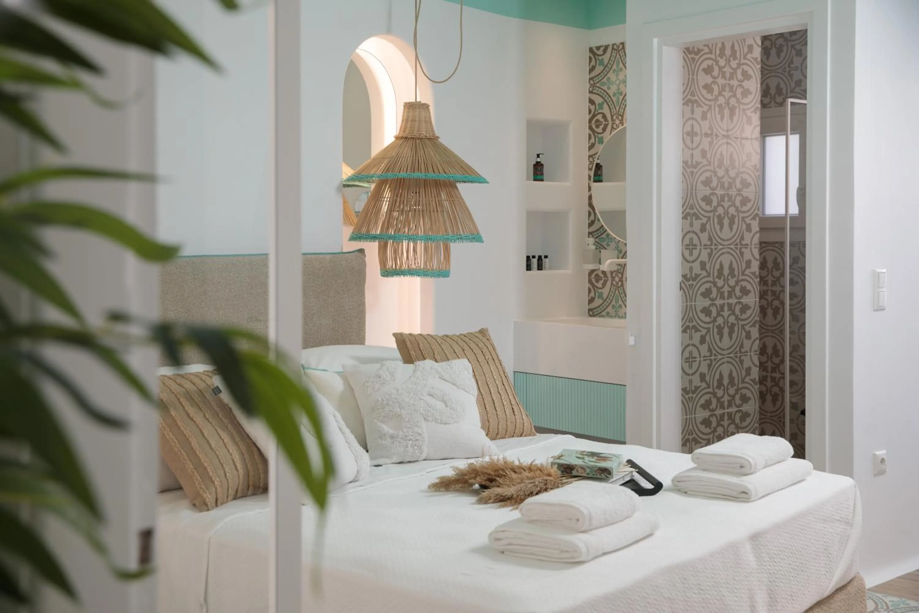 Bed in Flora Apartments & Studios