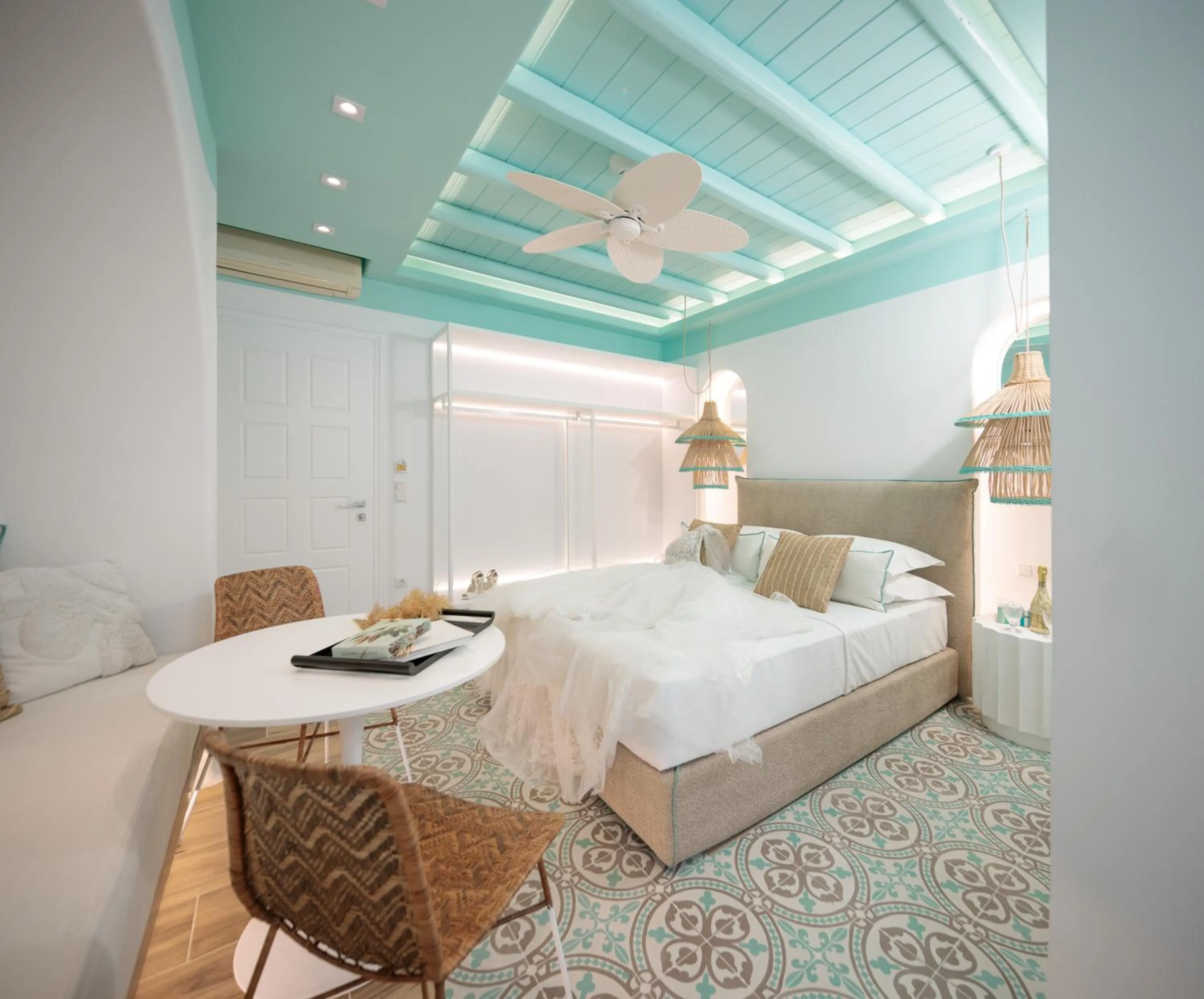 Bed in Flora Apartments & Studios