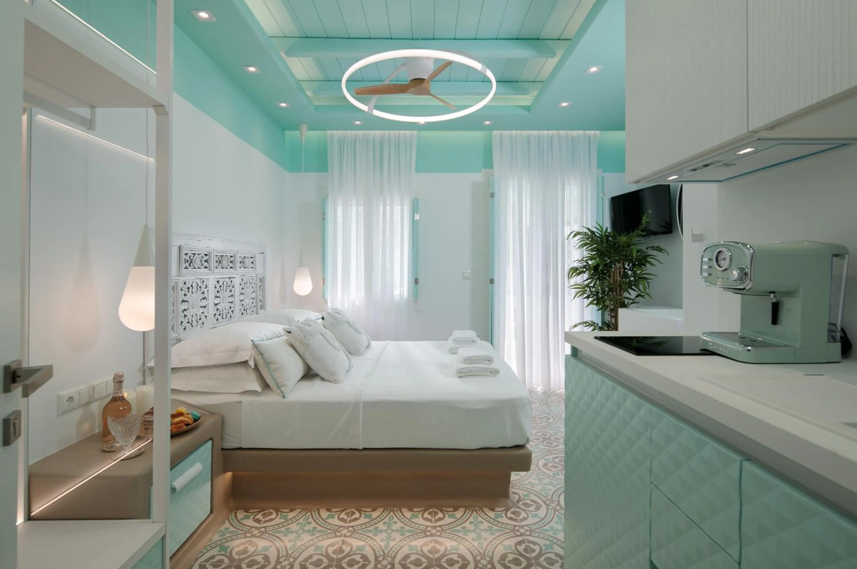Bed in Flora Apartments & Studios