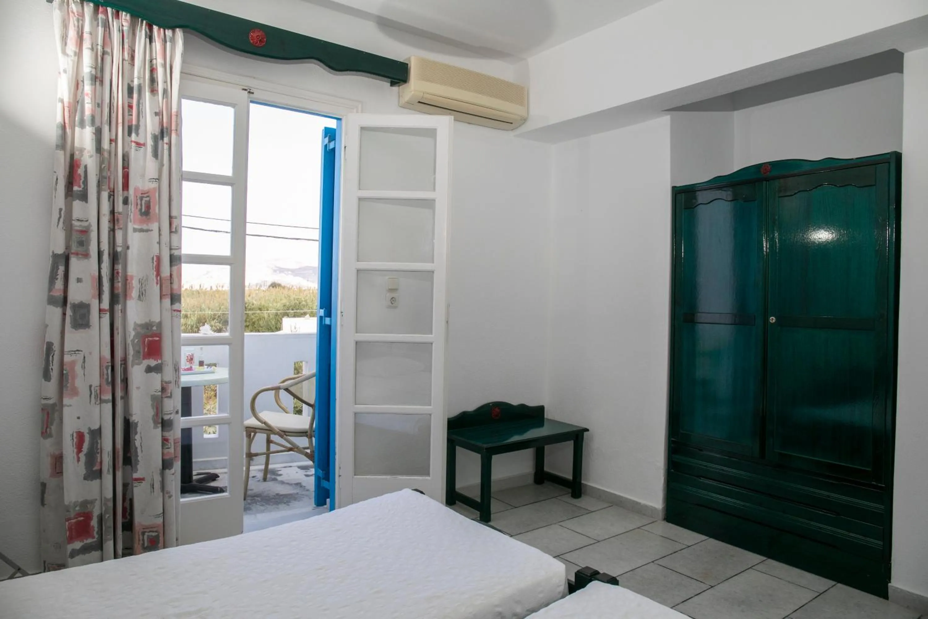 Balcony/Terrace, Bed in Flora Apartments & Studios