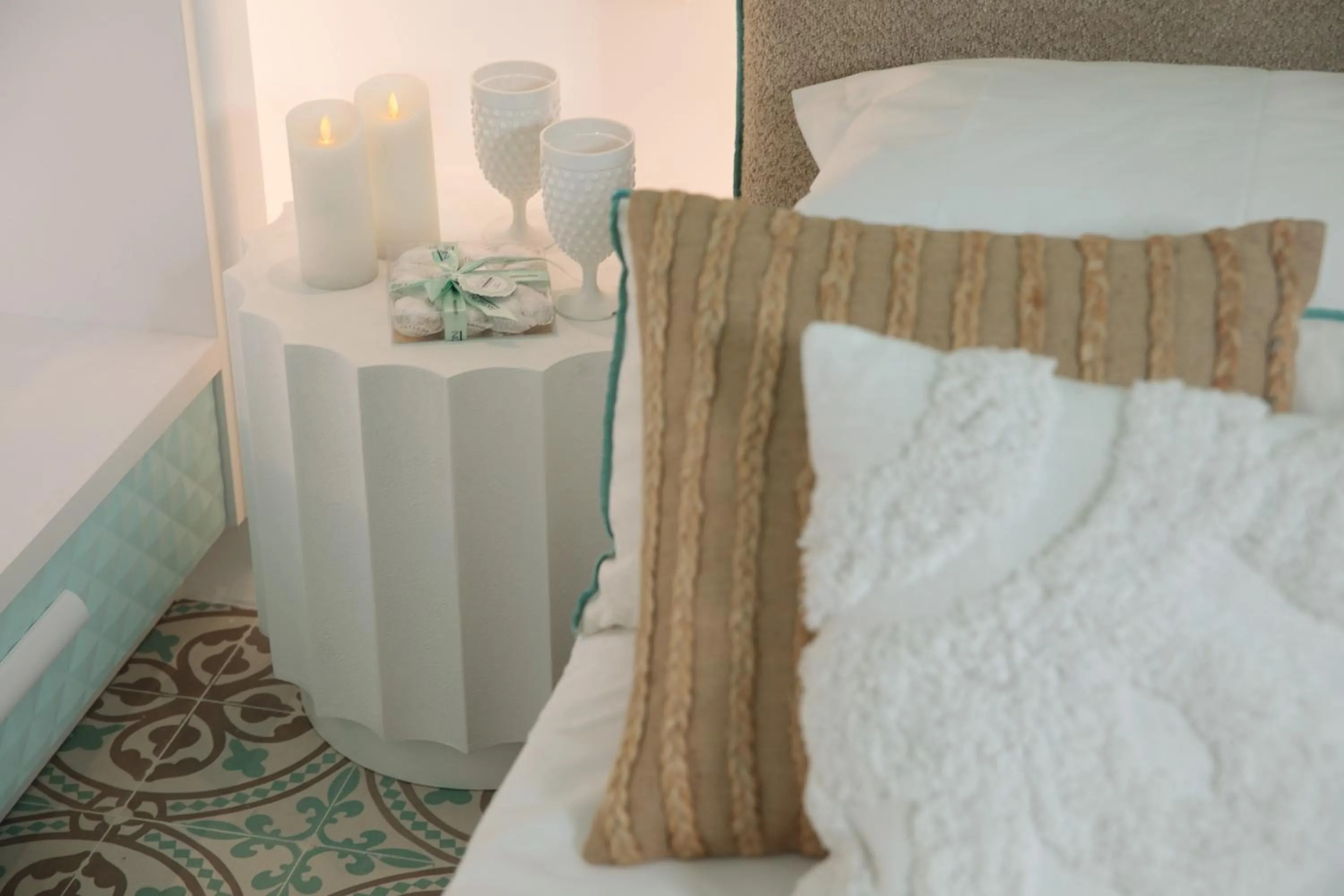 Bed in Flora Apartments & Studios