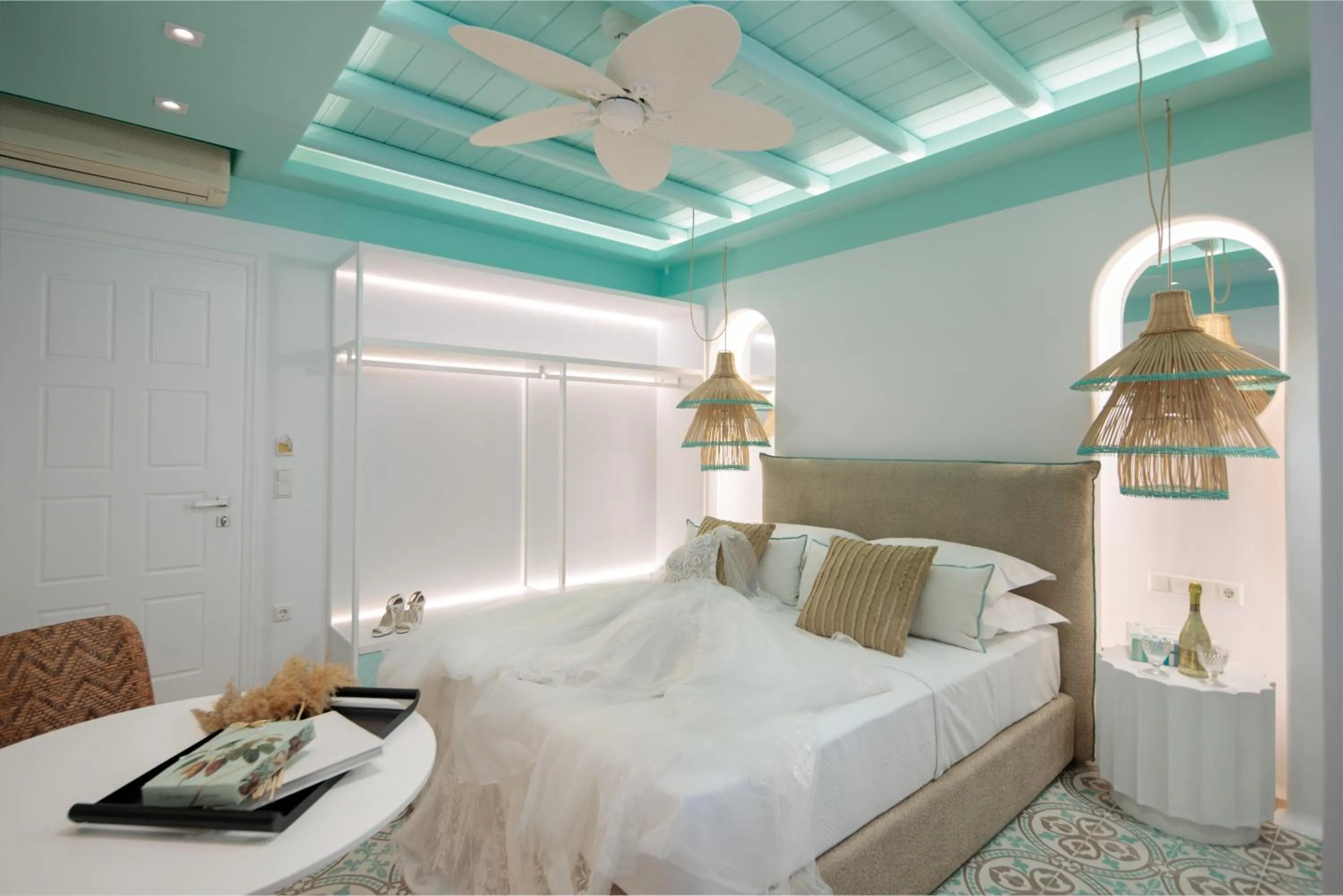 Bed in Flora Apartments & Studios