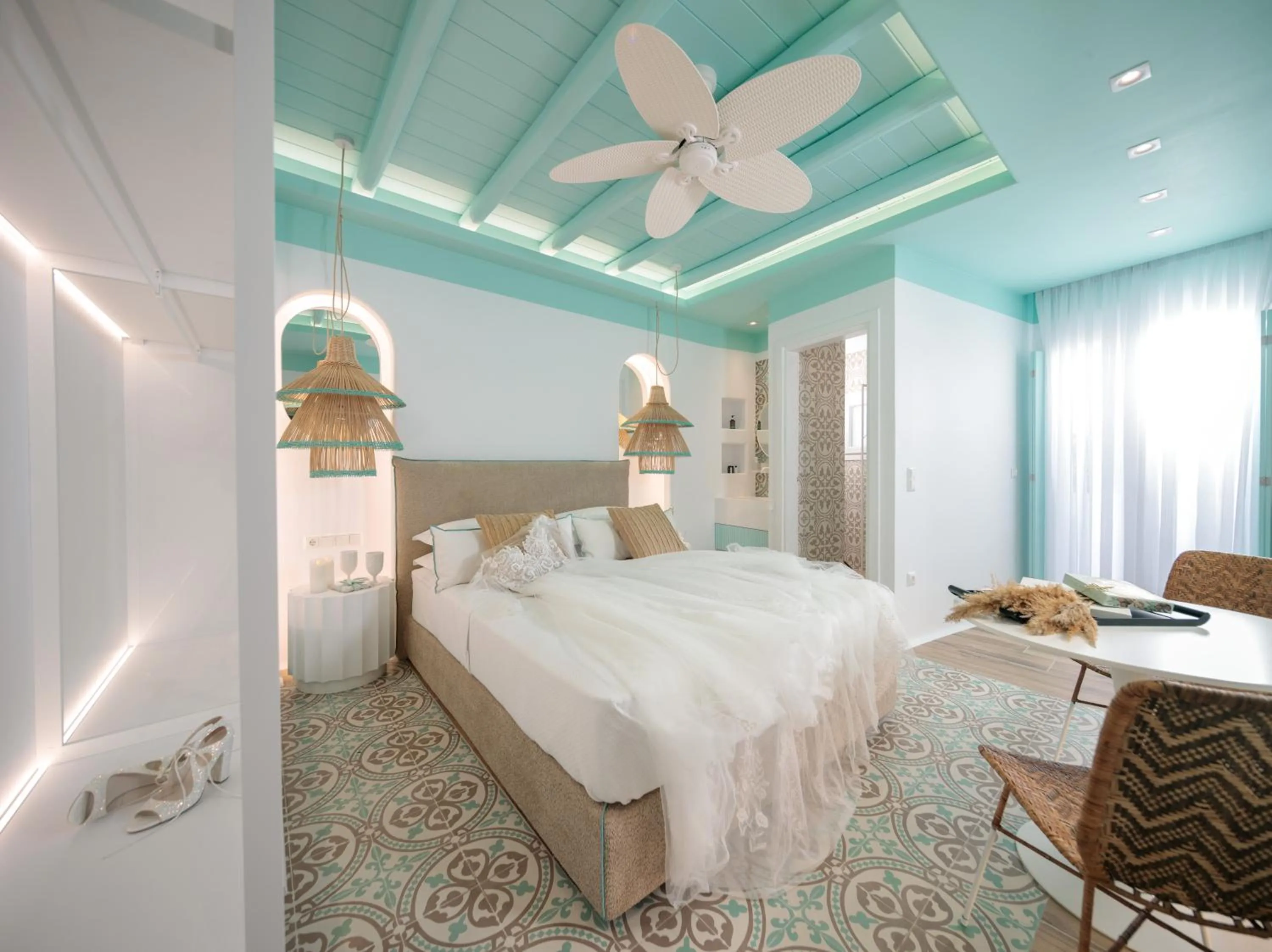 Bed in Flora Apartments & Studios