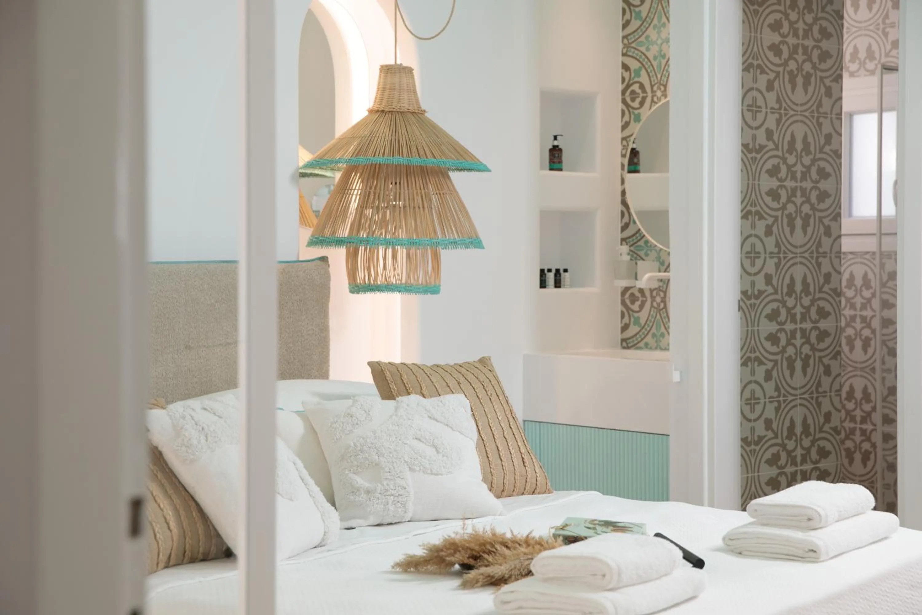 Bed in Flora Apartments & Studios